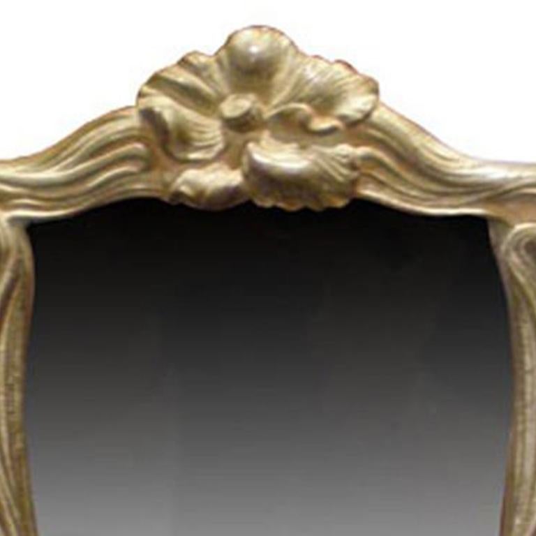 Specchio da toilette con cornice a cavalletto in stile Art Nouveau con testa di donna.