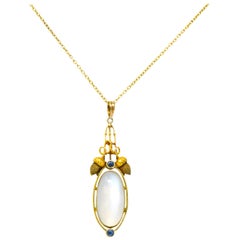 Antique Art Nouveau Moonstone Sapphire 14 Karat Gold Acorn Accented Pendant