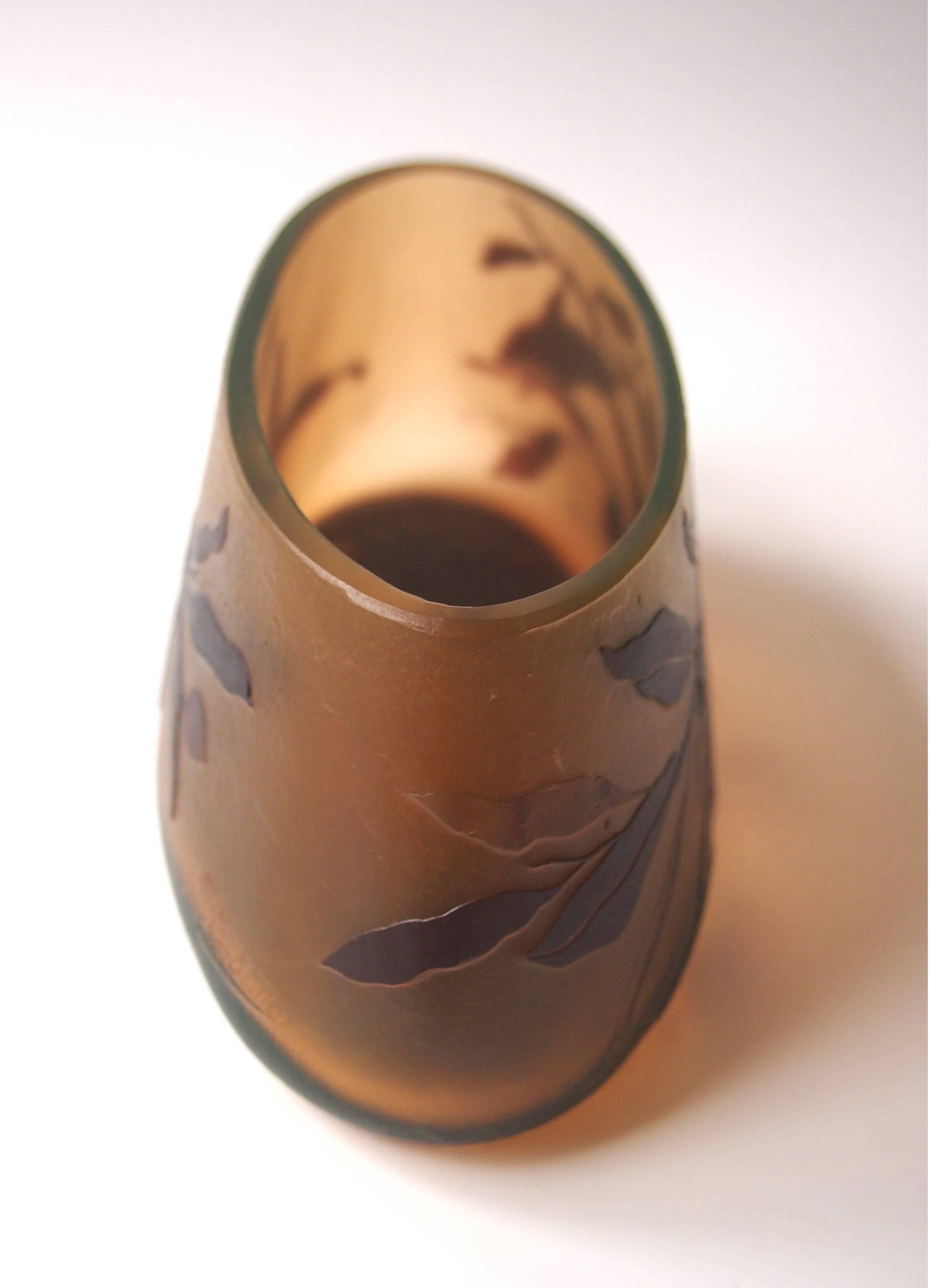 Very rare Moser Art Nouveau cameo vase depicting branches and berries designed by the Viennese Painter Otto Tauscek in brown glass over orange and uranium green -signed twice in cameo MK and Moser Karlsbad -see images 8 and 9. Moser only briefly