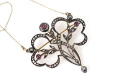 Art Nouveau necklace with rose cut diamonds and rubies.