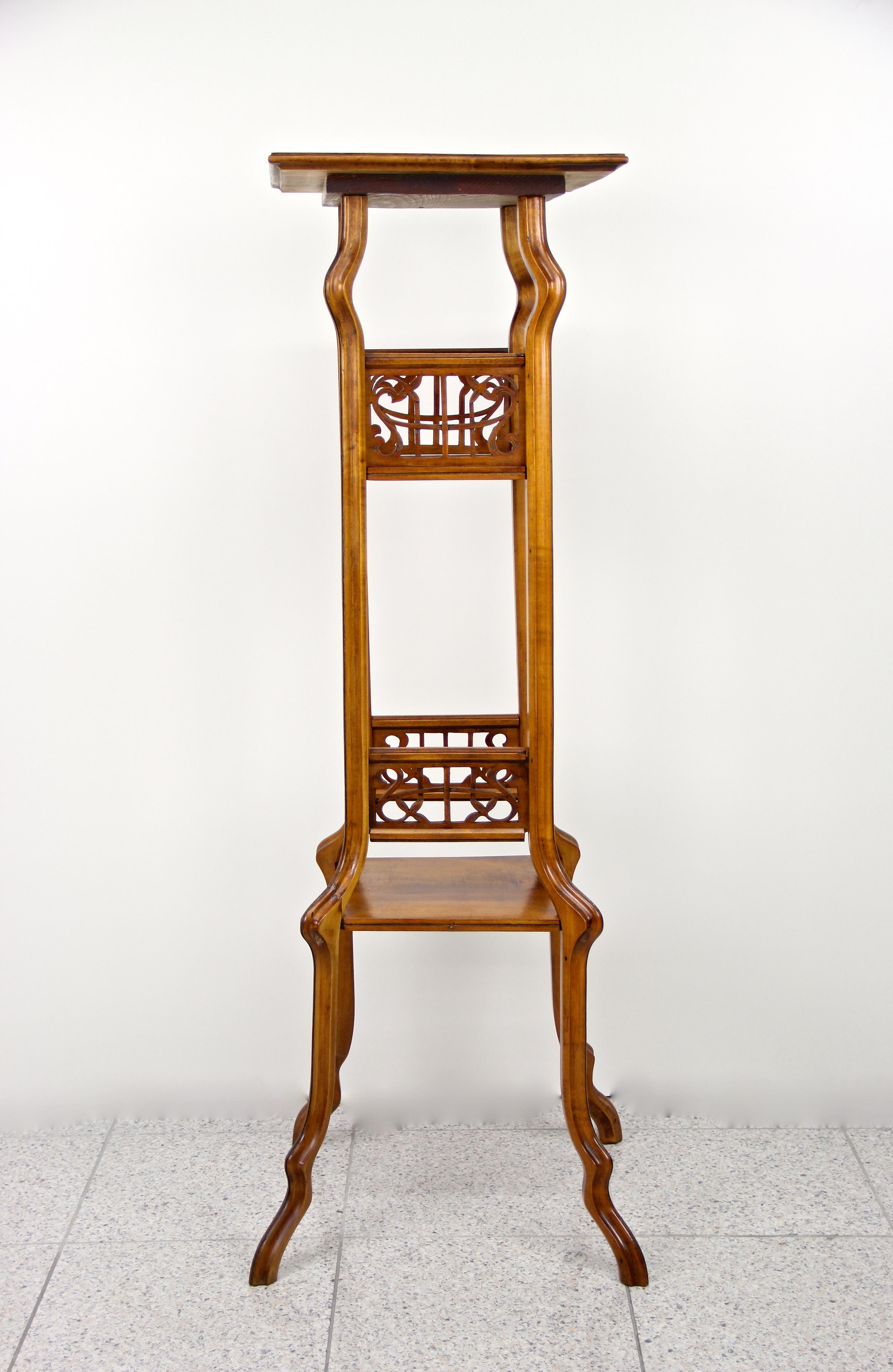 Exceptional Art Nouveau Pedestal from the early period in Austria circa 1900. This absolute unique light walnut column/ pedestal shows an impressive, artfully processed design with extraordinary lines. Representing the 