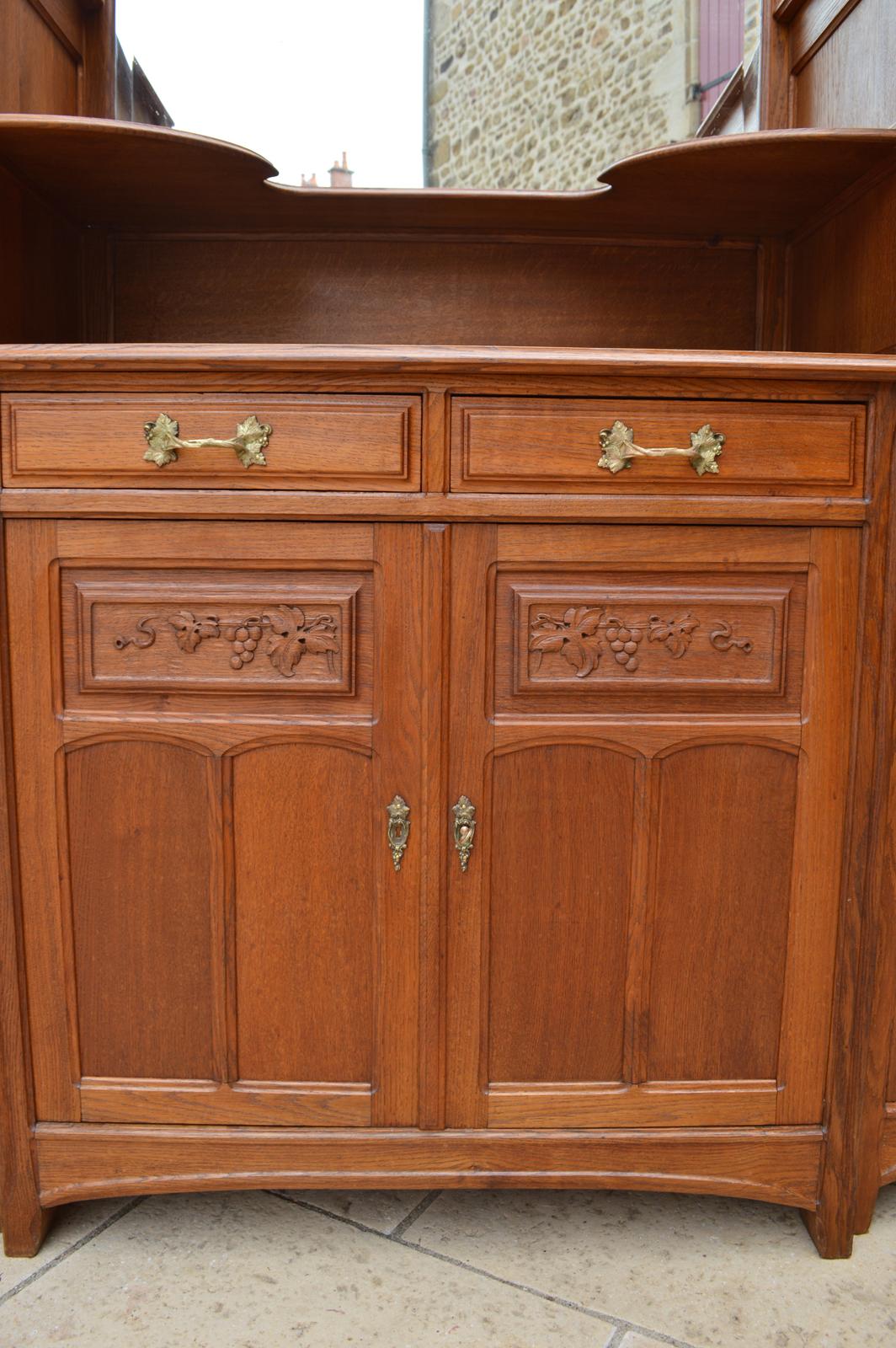 Early 20th Century Art Nouveau Oak Carved Dining Room Set by Gauthier Poinsignon, circa 1910 For Sale