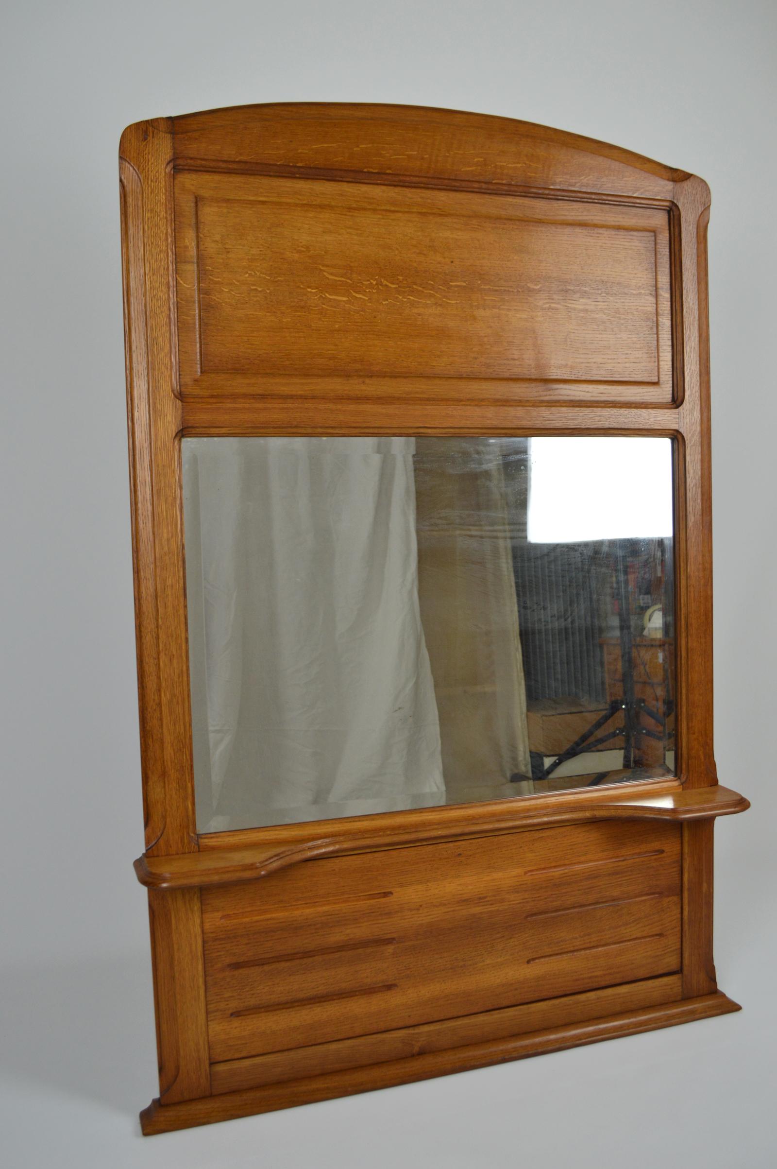 Beautiful fireplace or mantel or trumeau mirror in solid oak. 

Art Nouveau or Arts & Crafts, France, 1910-1920.

In the style of Mathieu Gallery’s productions.

Superb condition, professional restoration (stripping of the old finish,