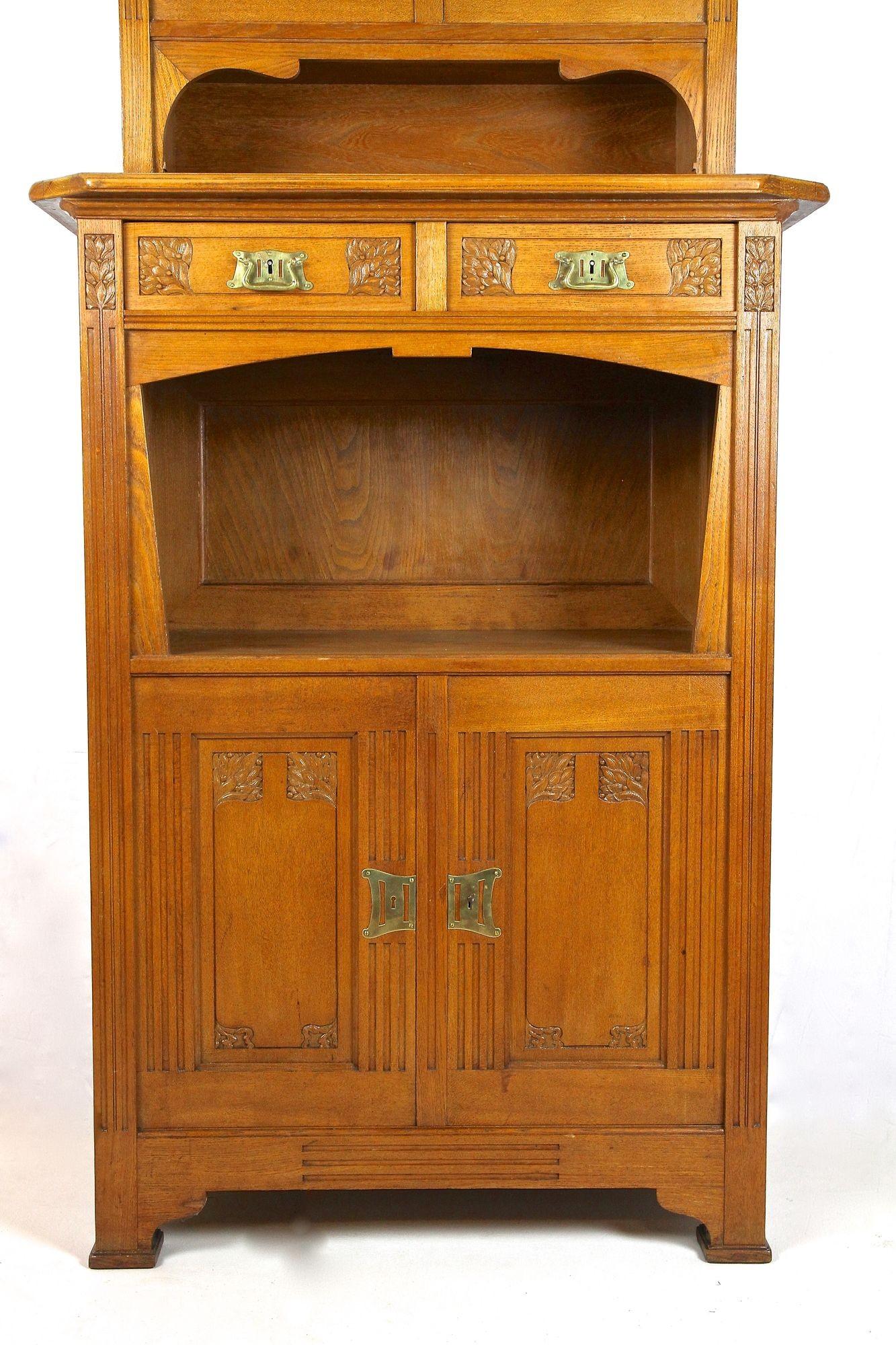 20th Century Art Nouveau Oakwood Cabinet/ Buffet With Tiffany Style Glass Inlays, AT ca 1910 For Sale