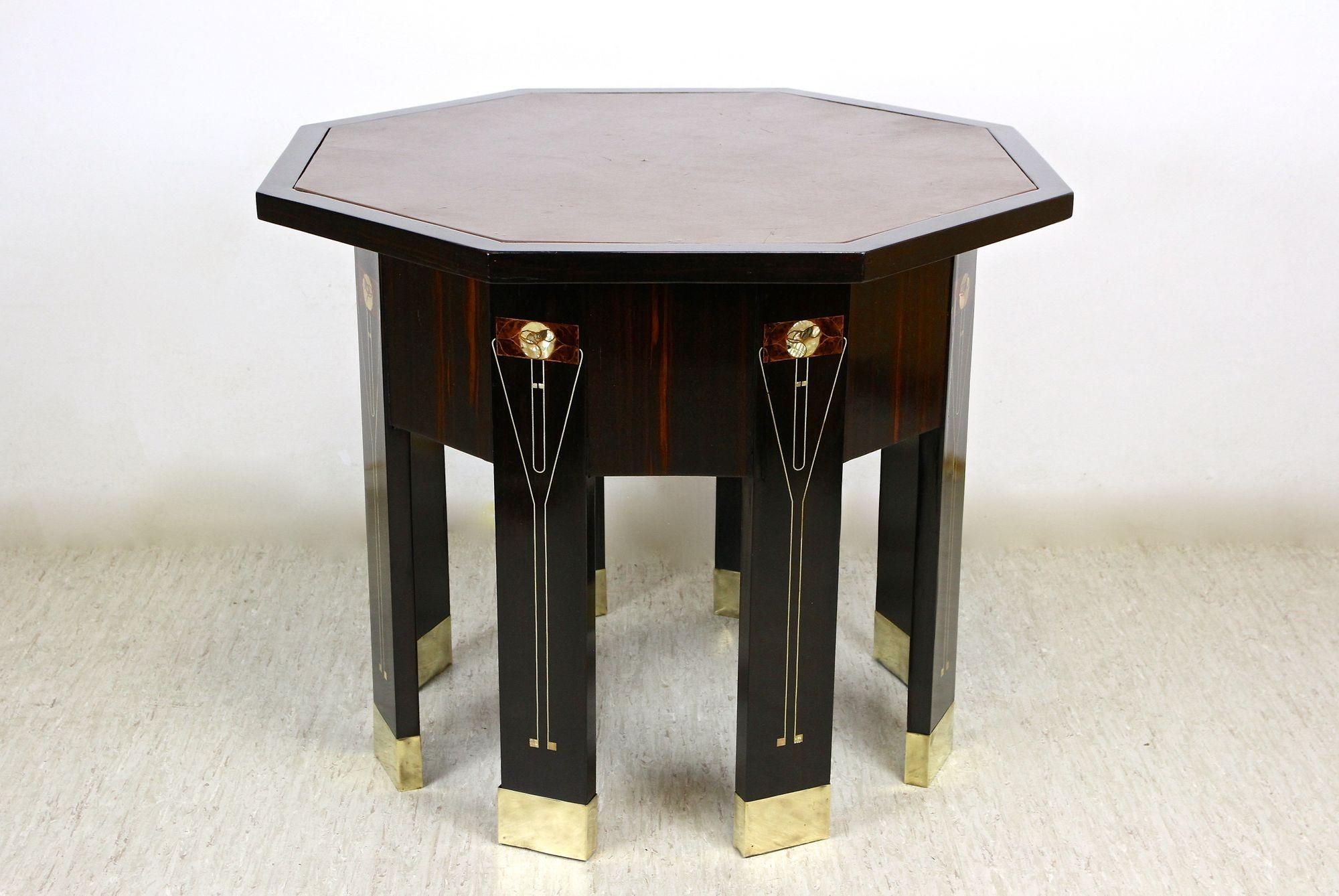 Absolute outstanding, one of kind Art Nouveau Palisander table from the very early 20th century in Vienna around 1905. This impressive antique coffee table is not just a 