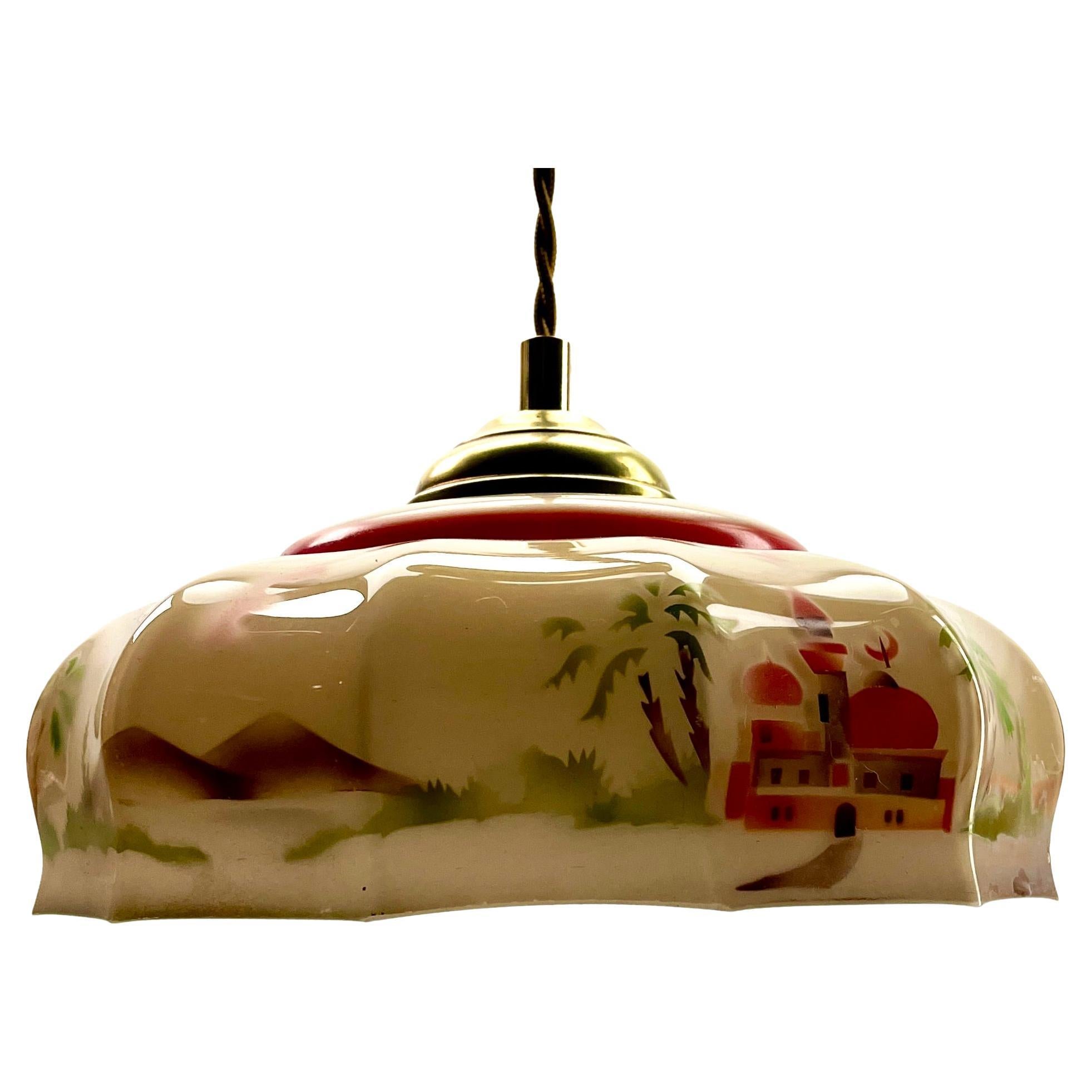 Art Nouveau ceiling lamp.
Photography fails to capture the simple elegant illumination provided by this lamp.

Fitting messing pendant ceiling light with fixing to hold a stylish Belgian Art Deco lampshade. 
Good distribution of darker and lighter