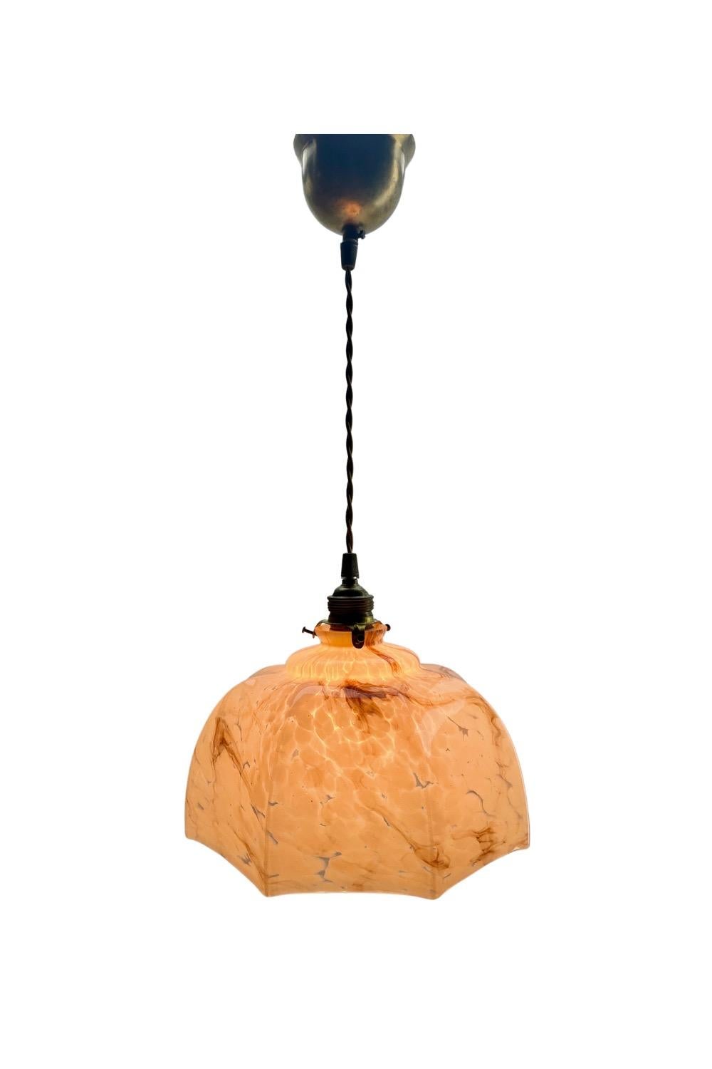 Art Nouveau ceiling lamp.
Photography fails to capture the simple elegant illumination provided by this lamp.

Fitting messing pendant ceiling light with fixing to hold a stylish Belgian Art Deco lampshade. 
Good distribution of darker and lighter