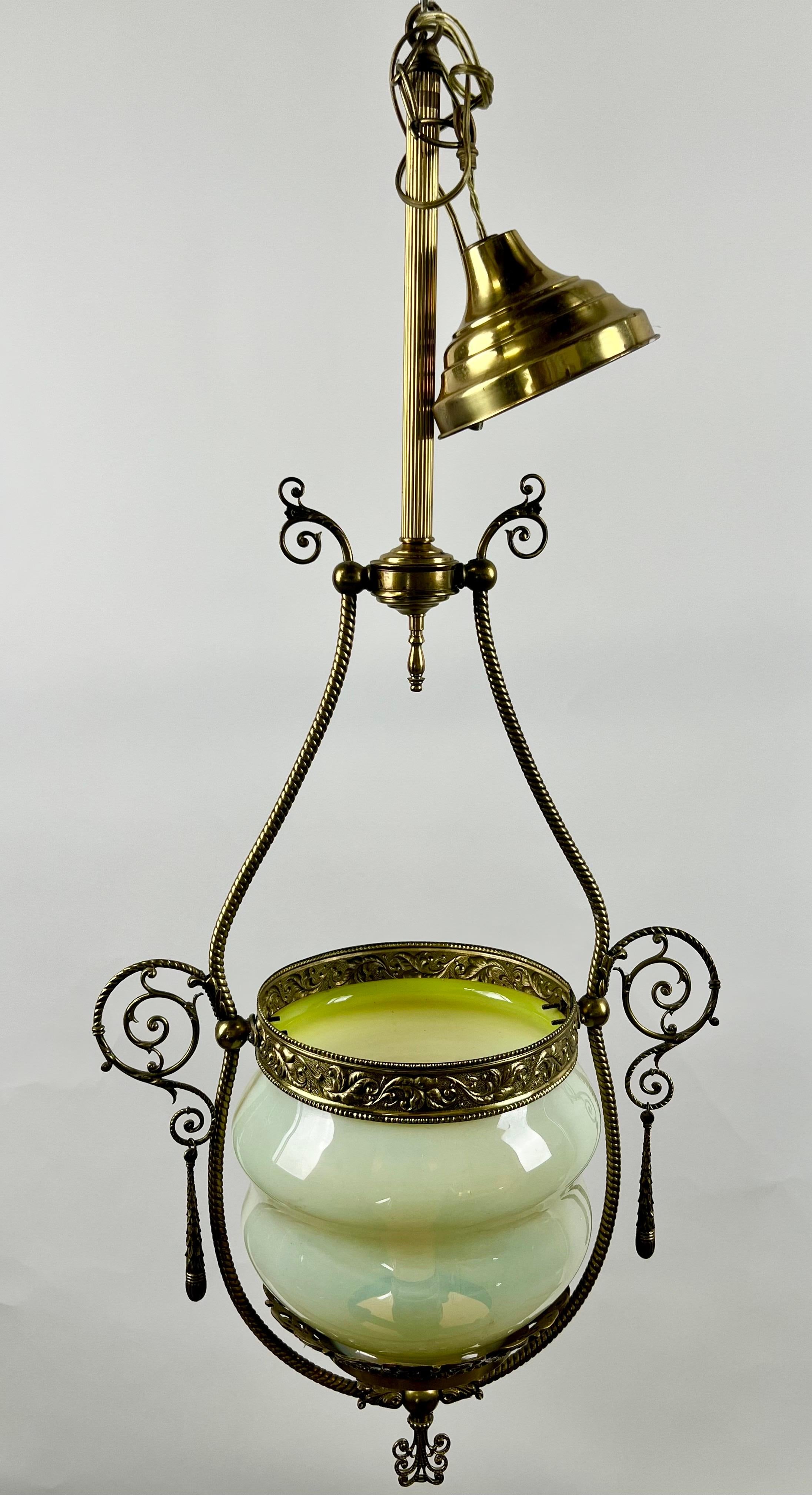 Art Nouveau Opaline Glass & Bronze Chandelier or Pendant : 

This exquisite Art Nouveau antique pendant chandelier is a refined example of early 20th-century craftsmanship and decorative art. The piece features a large, opaline glass bowl with soft
