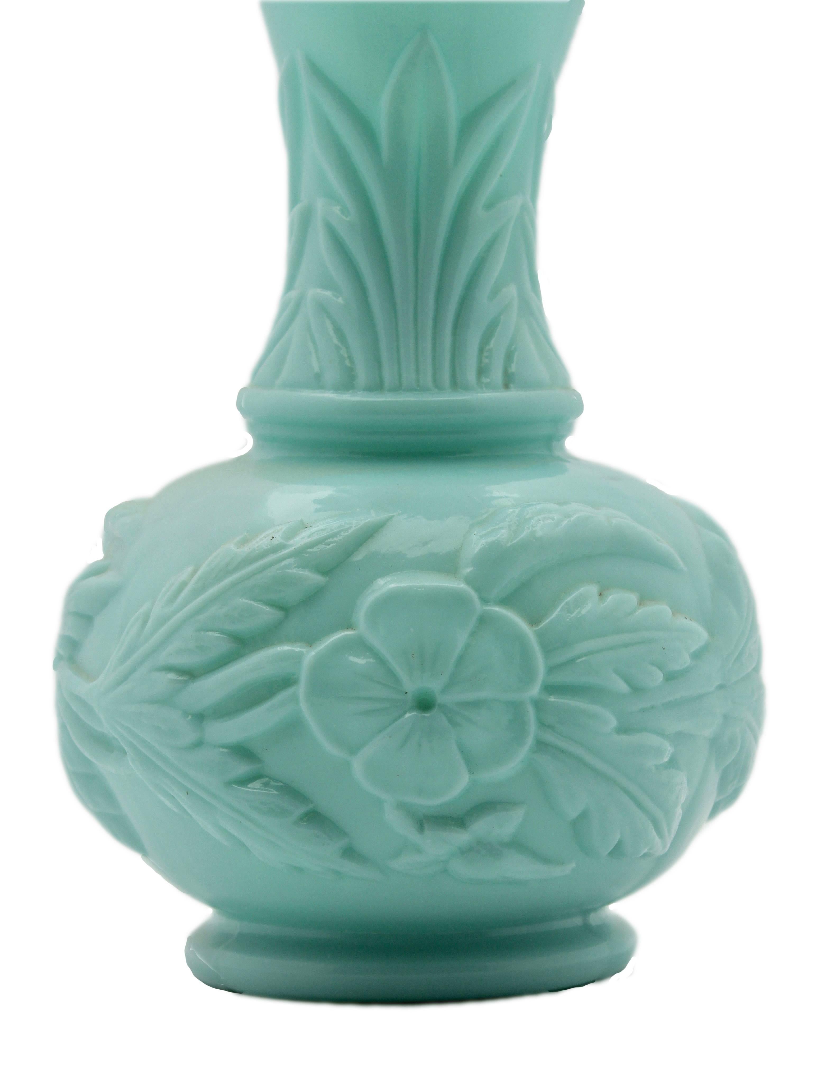 French opaline vase in mint color.
This beautiful large antique opaline glass vase in mint color is believed by French glass manufacturer Portieux Vallerysthal. The richly decorated vase comes from circa 1900. The Art Nouveau or Jugendstil milk