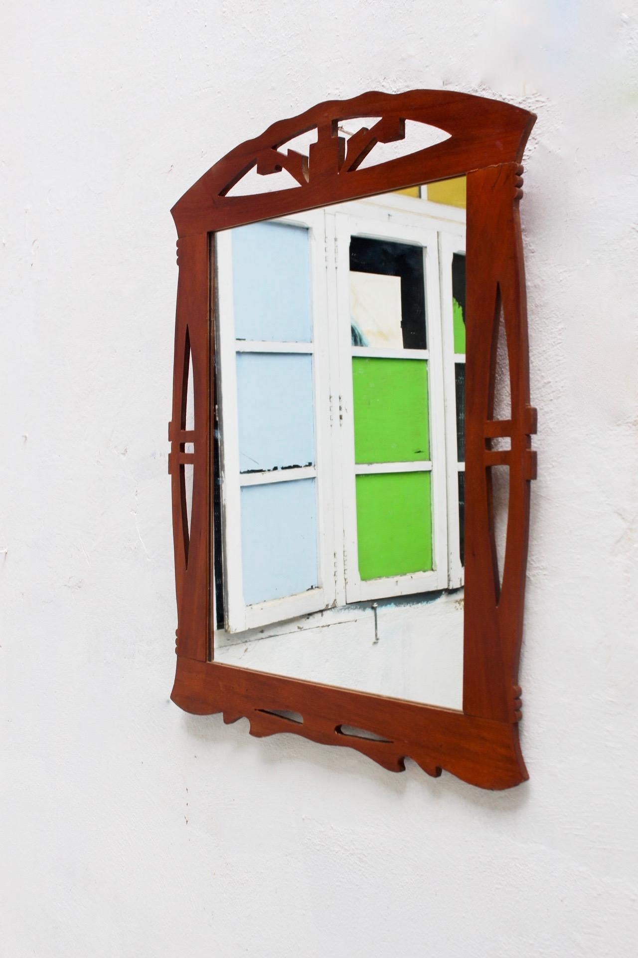 Art Nouveau or modernist Spanish wood wall mirror, 1910s.