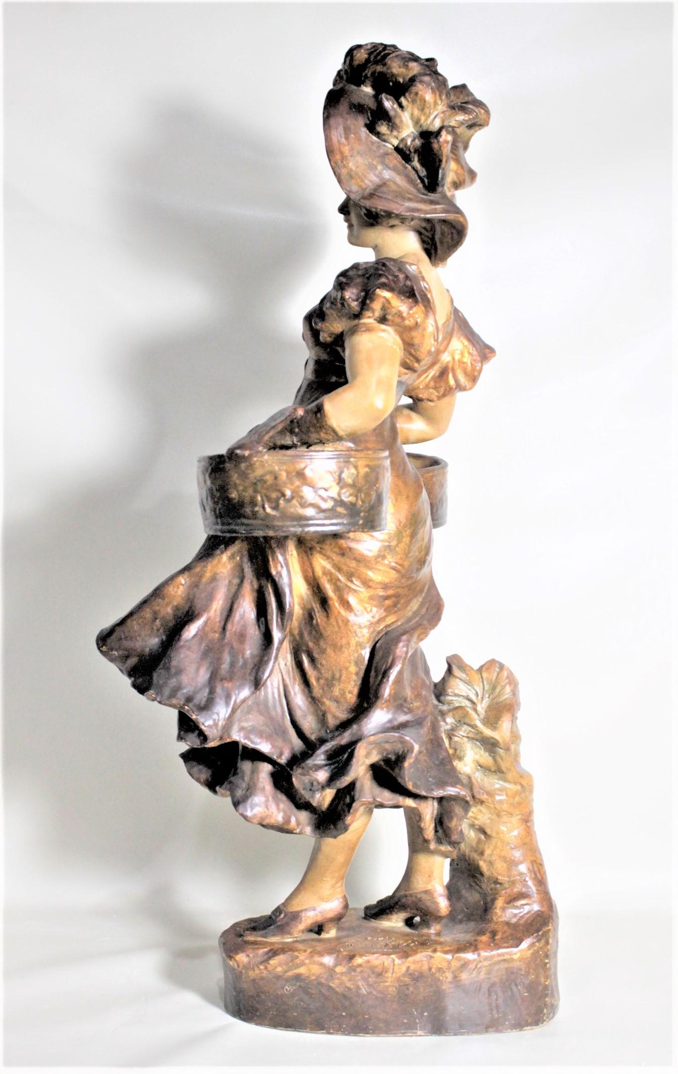 Art Nouveau Otto Petri Glazed Earthenware Sculpture of a Woman Carrying Baskets In Good Condition For Sale In Hamilton, Ontario