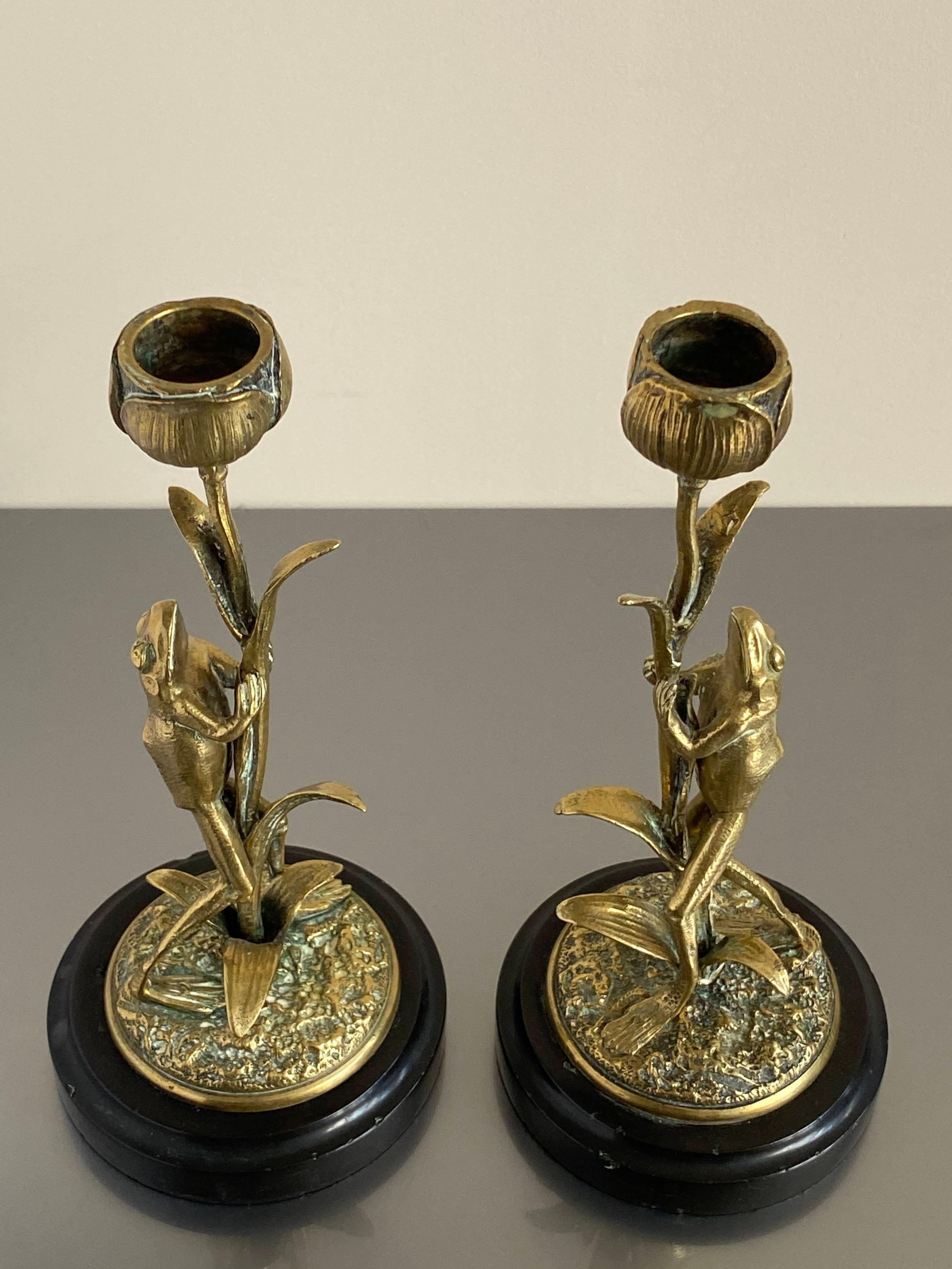 Cast Art Nouveau Pair of Brass Candle Sticks Modelled as Frogs Climbing Lotus Flowers