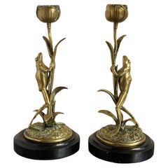 Art Nouveau Pair of Brass Candle Sticks Modelled as Frogs Climbing Lotus Flowers