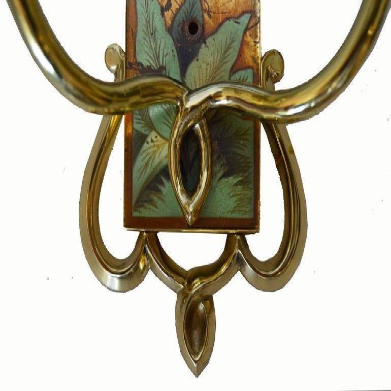 Sublime pair of Art Nouveau painted sconces in the style of Paul Jouve two lights, 40 watts max per light, US rewired and in working condition. Backplate dimension: 8' H, 3' W. Dimension without shade 13.5 H, 10' W, 6 ' D.
Have a look on our