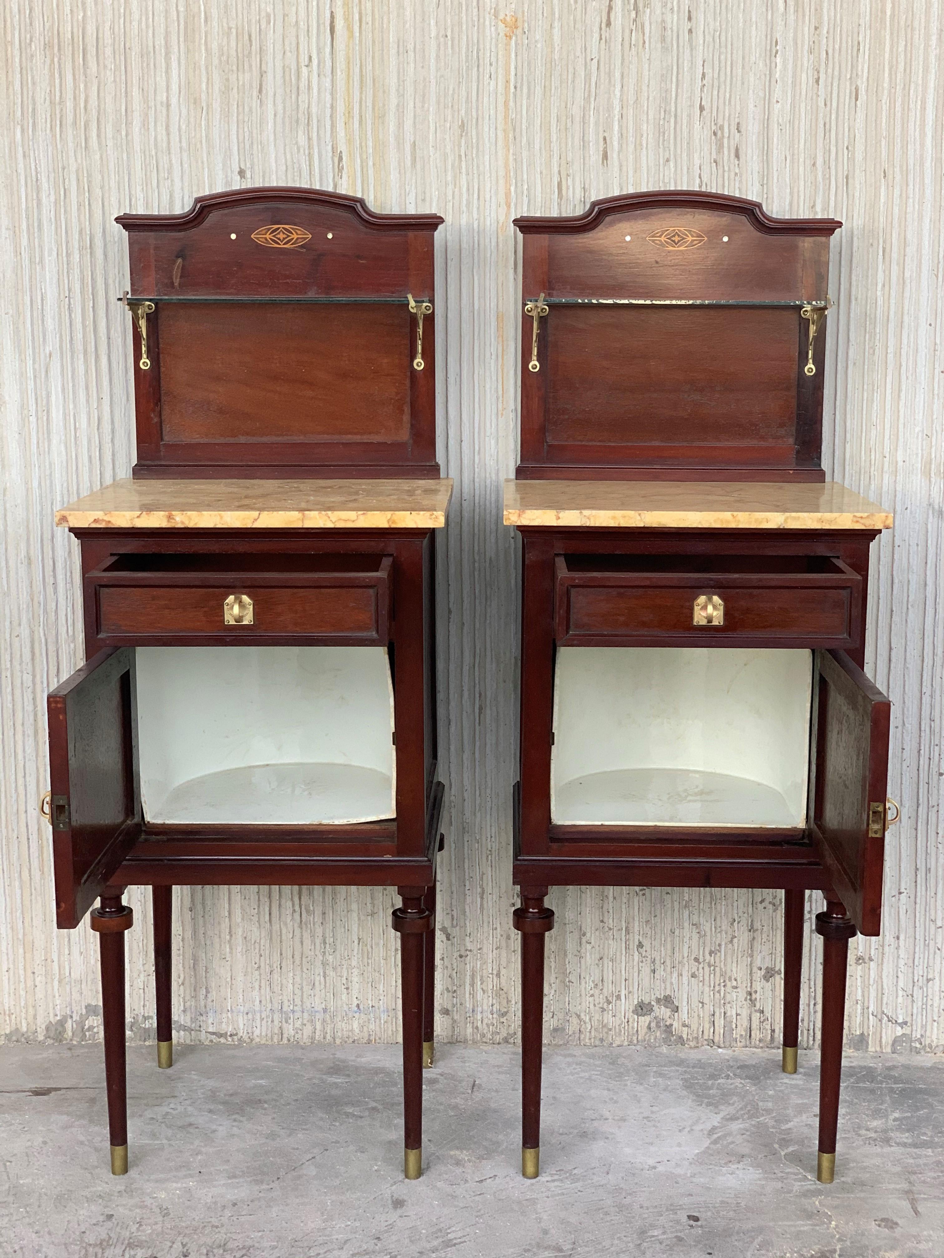 20th Century Art Nouveau Pair of Walnut Nightstands with Crest, Marble Top and Glass Shelve For Sale