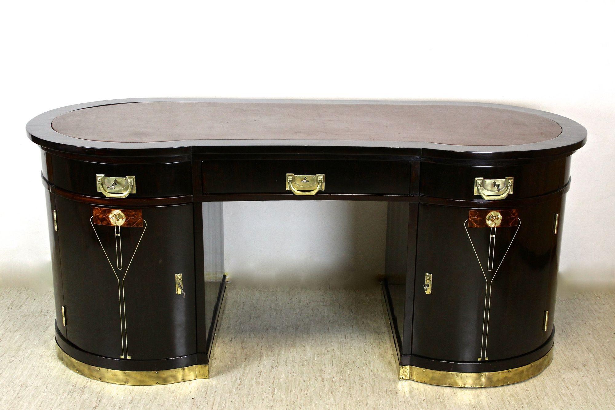 Breathtaking, one of kind Art Nouveau Palisander Writing Desk from the very early 20th century in Vienna around 1905. This impressive antique desk is not just a 