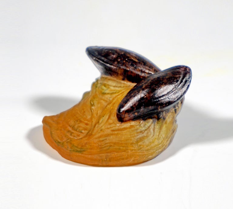 Two mussels on a yellow stone base covered with algae. Signed 'AWALTER NANCY' and 'hm'.

Manufactory: Amalric Walter & Henri Bergé, Nancy, Lorraine, France
Dating of manufacture: circa 1920/1930

Designer:
Victor Amalric Walter (1870-1959) was