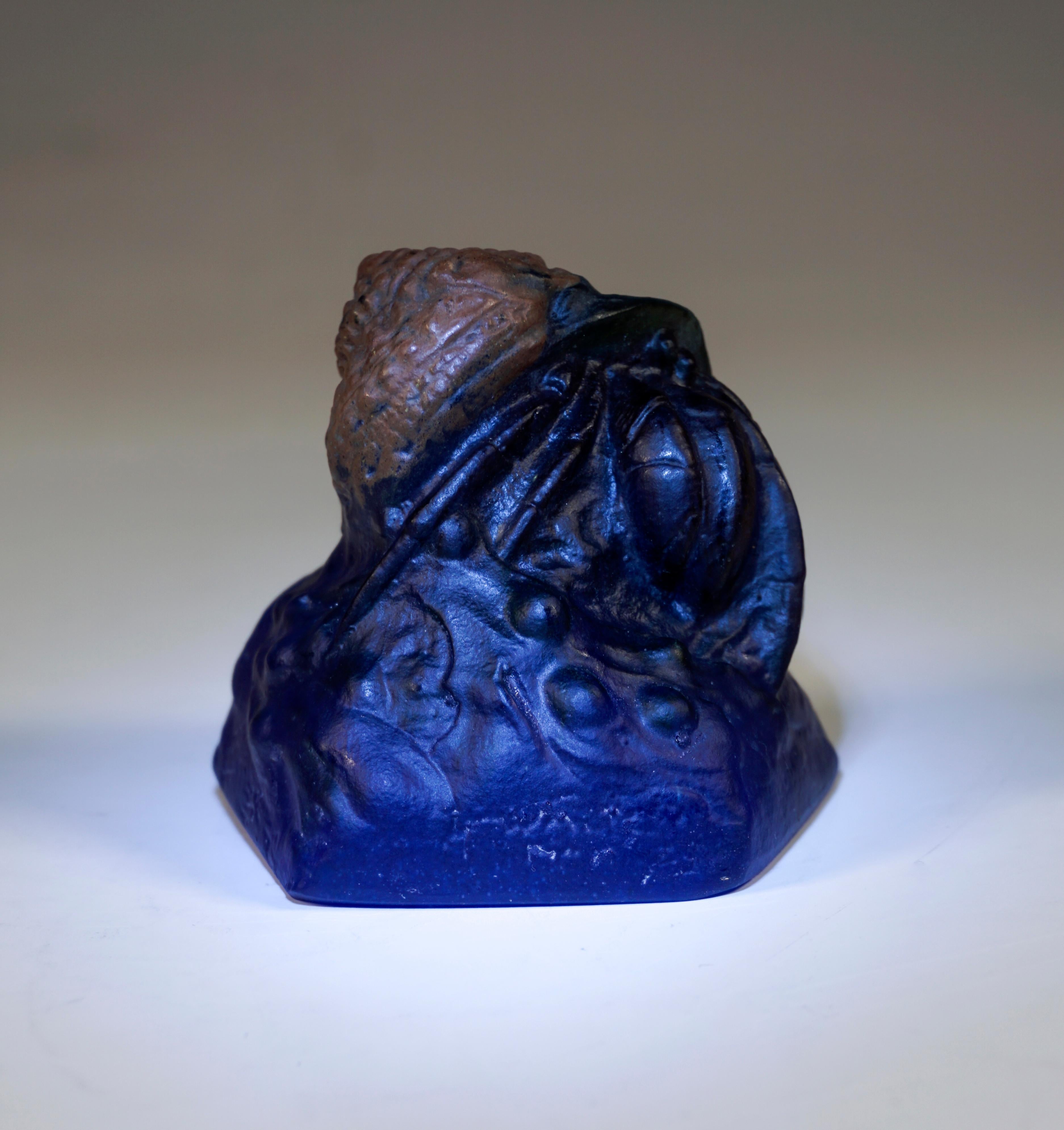 Pâte de Verre Paperweight 'Bernard l'Heremite':
Hermit crab in shades of black-brown and green with brown snail shell on dark blue seabed base with pentagonal plan. Signed 'Bergé' and 'AWALTER' on the sides.

Manufactory: Amalric Walter & Henri