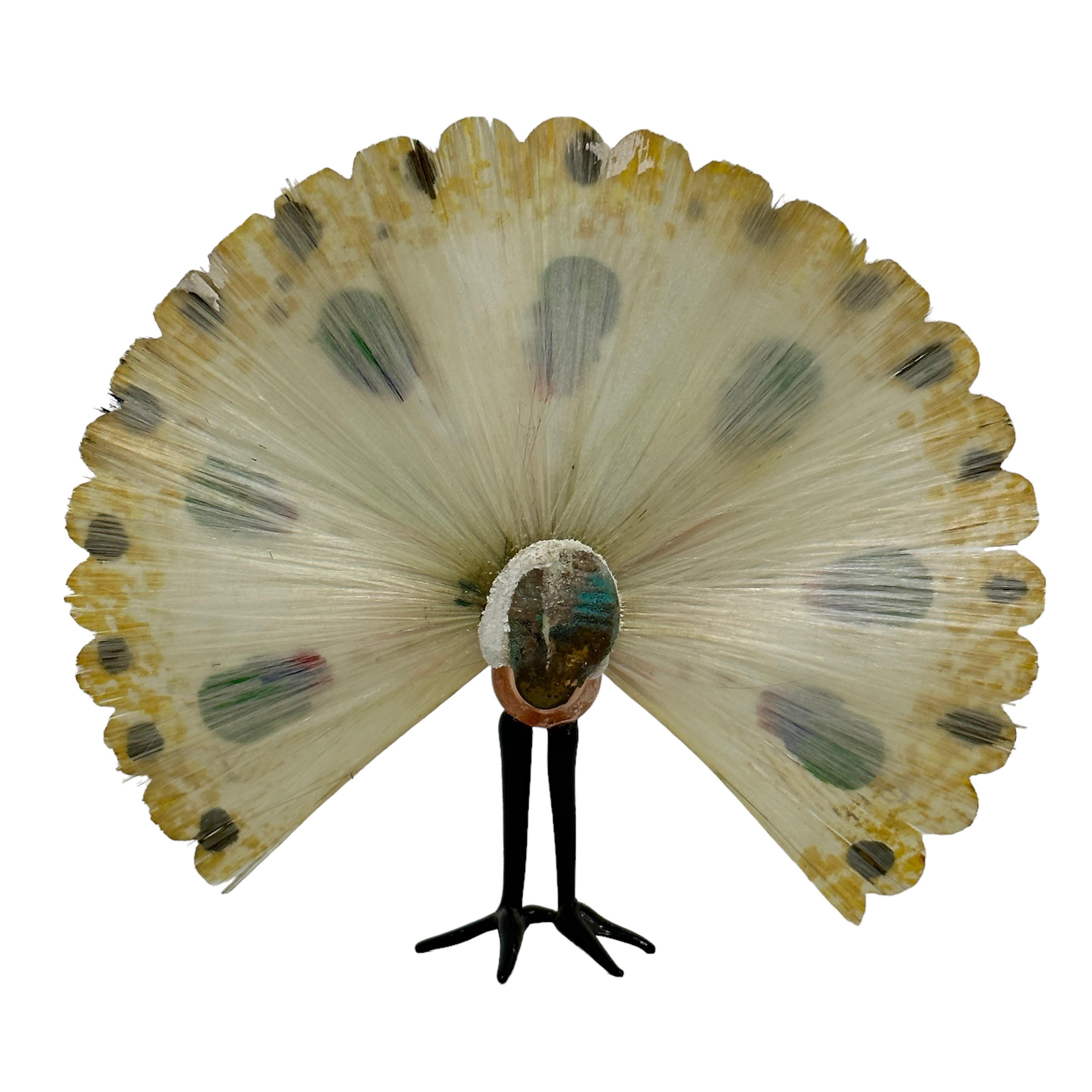 glass peacock figurine
