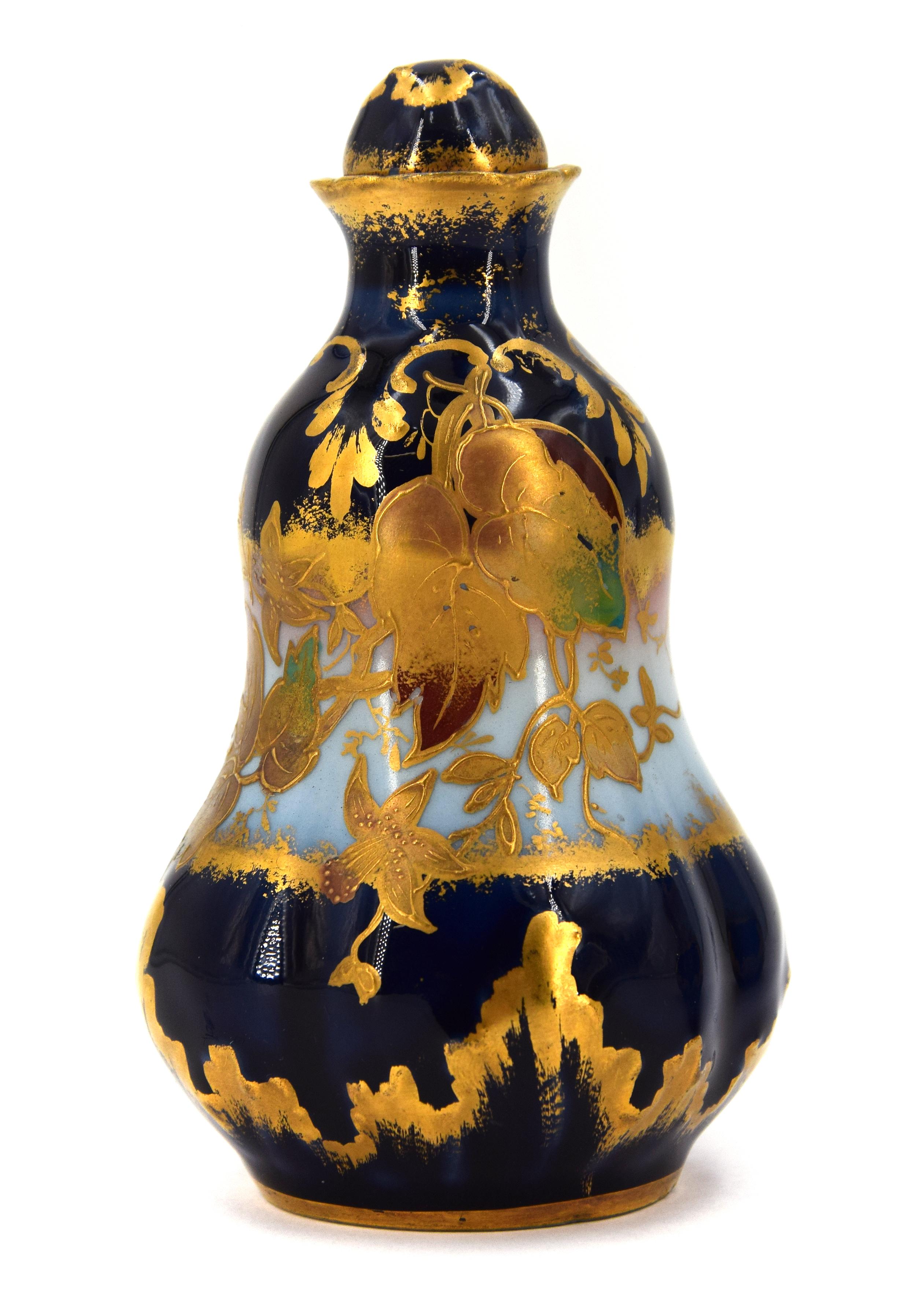 Couple of little French perfume bottles. Blu porcelain with gilded decoration in relief. Art Nouveau period. 

This artwork is shipped from Italy. Under existing legislation, any artwork in Italy created over 70 years ago by an artist who has died