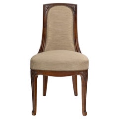 Silla de escritorio de época Art Nouveau en madera tallada, circa 1900.