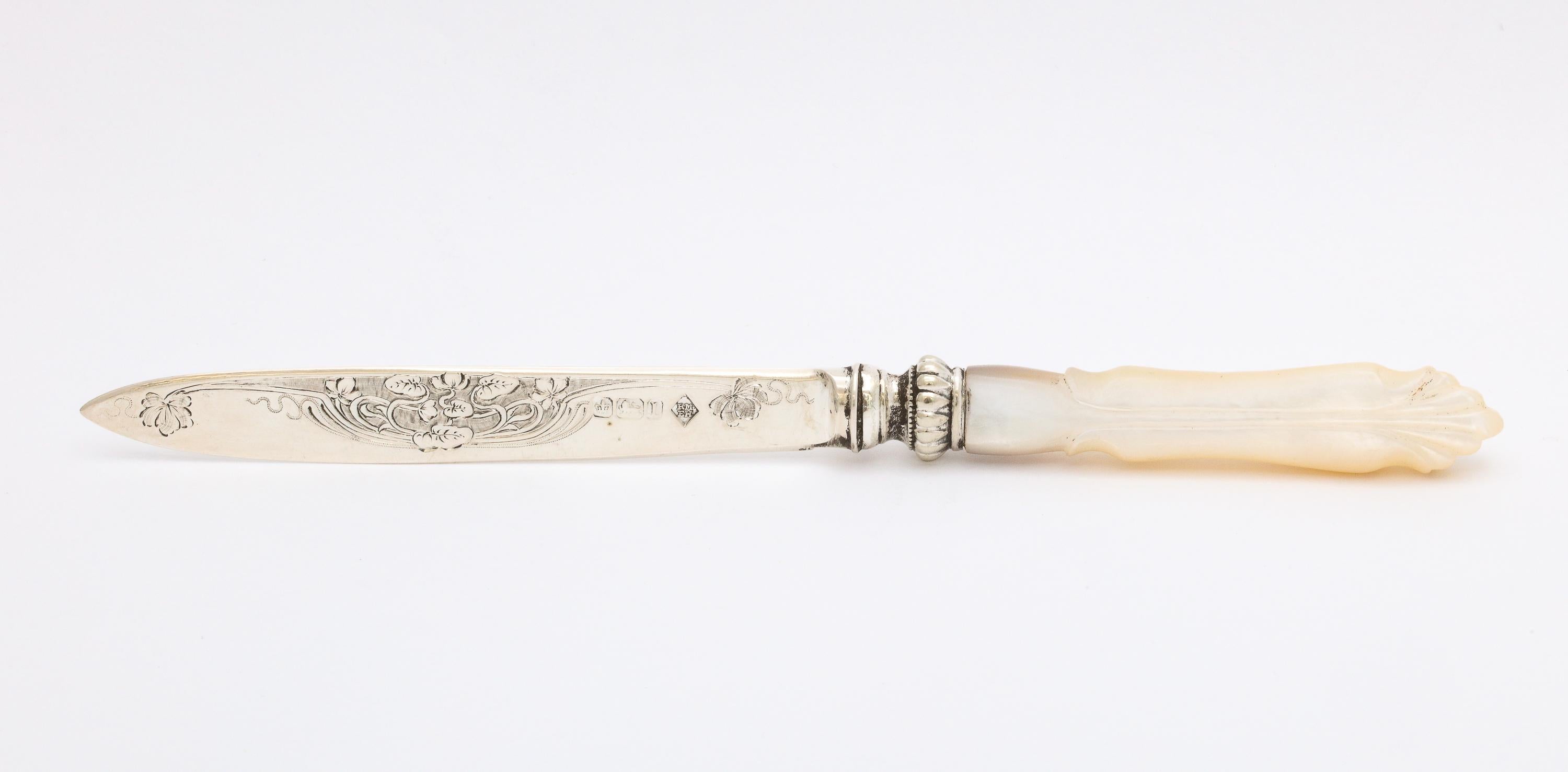 Art Nouveau period, sterling silver and mother-of-pearl letter opener/paper knife, Sheffield, England, year-hallmarked for 1903, Ebenezer and Richard Martin (Martin and Hall) - makers. Measures 7 1/2 inches long x almost 3/4 of an inch wide (at