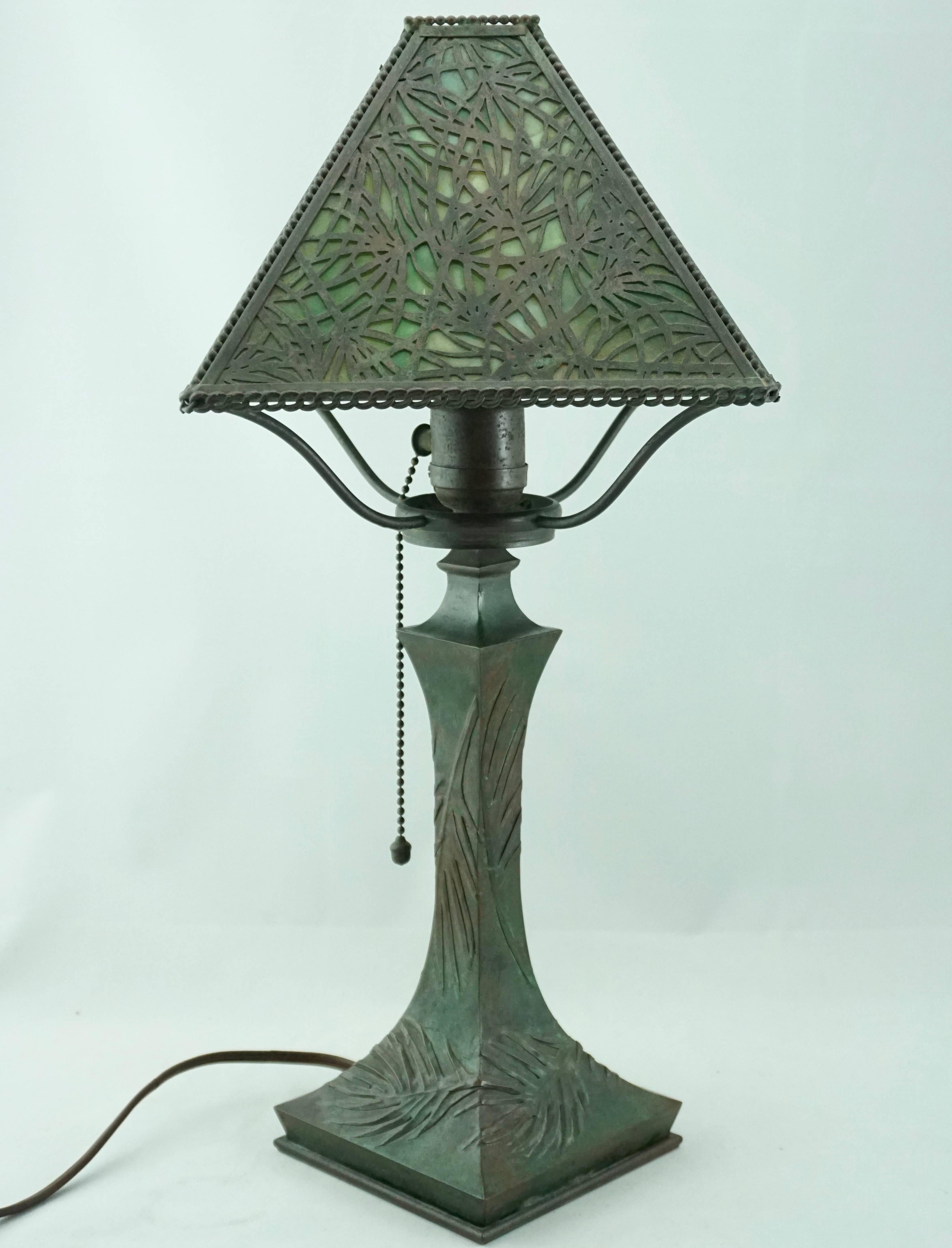 Riviere brass and bronze works / Riviere Studios table or desk lamp with beautiful brown and green patina, New York, NY, patinated bronze, slag glass, circa 1900. Similar to period Tiffany Studios Pinee Needle and Appolo Studios Lamps.

Measure: