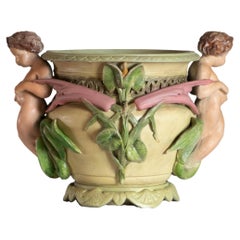 Jugendstil-Pflanzgefäß mit Putten und Blattwerk, 20. Jahrhundert