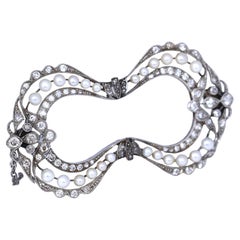 Art Nouveau Platinum Bow Brooch Natural Pearls Diamonds, 1910