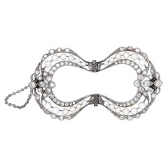 Art Nouveau Platinum Bow Brooch Natural Pearls Diamonds, 1910