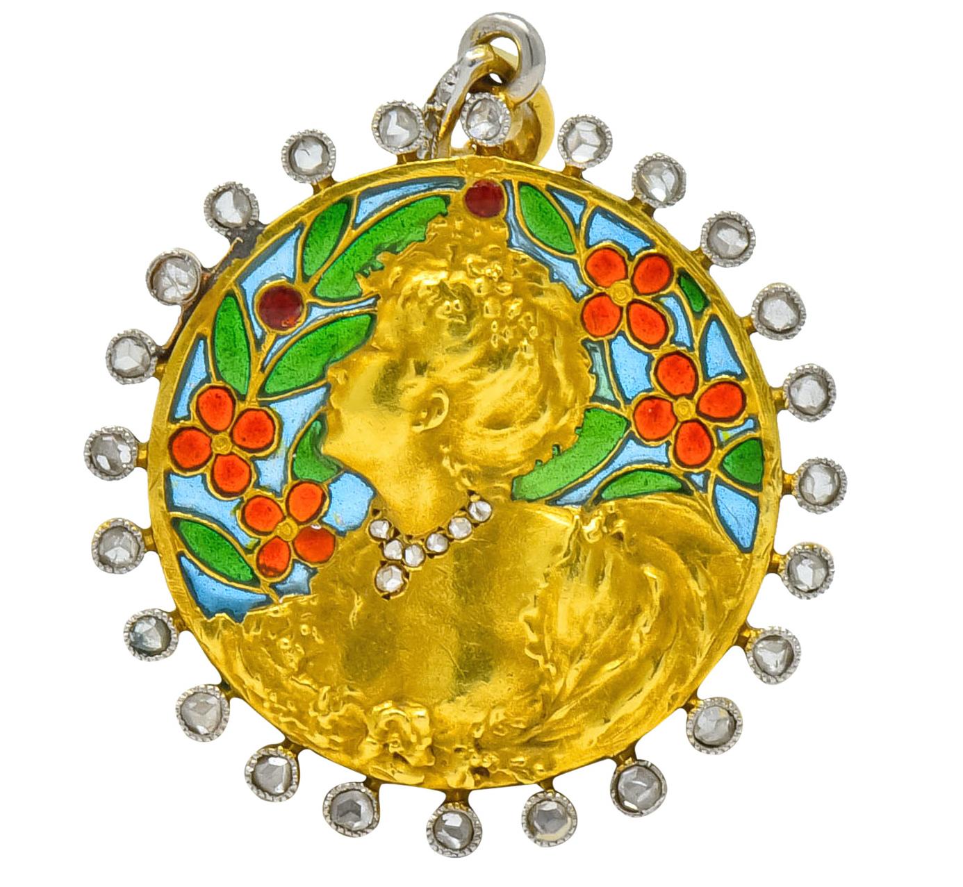 Centering a round disk pendant depicting a highly rendered, impressionist inspired, image of a fancily dressed woman

With red and green floral foliate plique-à-jour enamel background 

Surrounded by rose cut diamonds, bezel set in millegrain