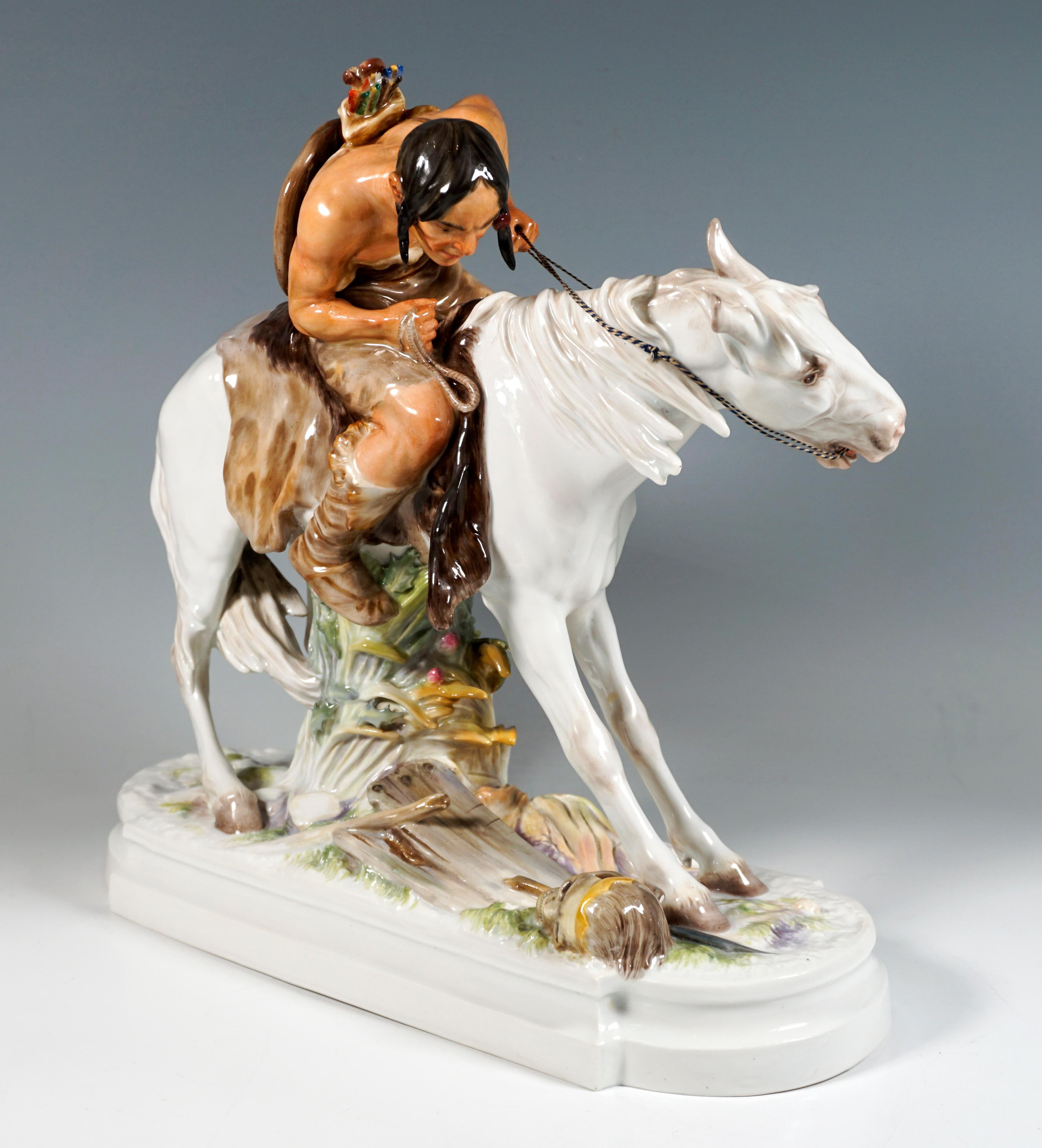 Exquisite Large Meissen Art Nouveau Porcelain Group:
Depiction of a mounted warrior, armed with shield and bow on his back, leaning from his horse to look down at a crowned skull. While the horse with stiff forelegs shies away from the gruesome