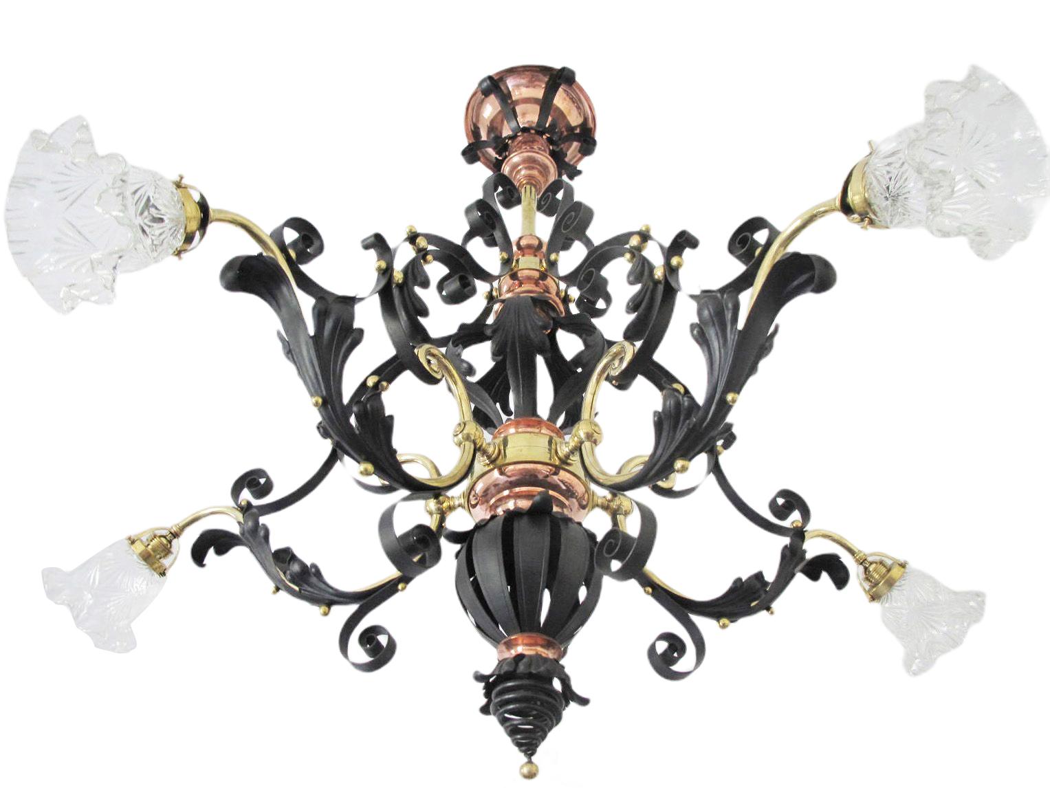 Get a chandelier at home, dominated by geometric shapes typical of Art Nouveau - flowers, ornaments and other shapes. The chandelier has 5 arms and rich decoration in the form of beautifully elaborated decoration. All parts, including lampshades,