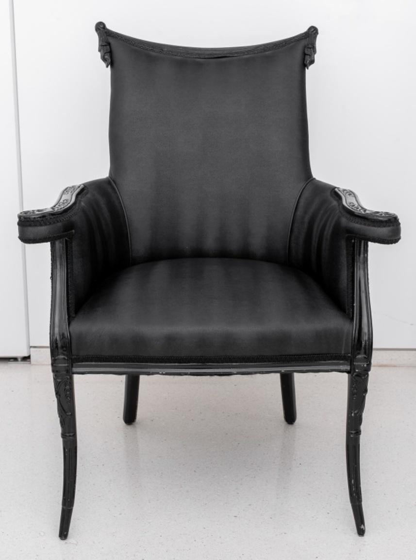 Art Nouveau revival modern ebonized carved wood arm chair raised on cabriole tapered legs, upholstered in black fabric. 39