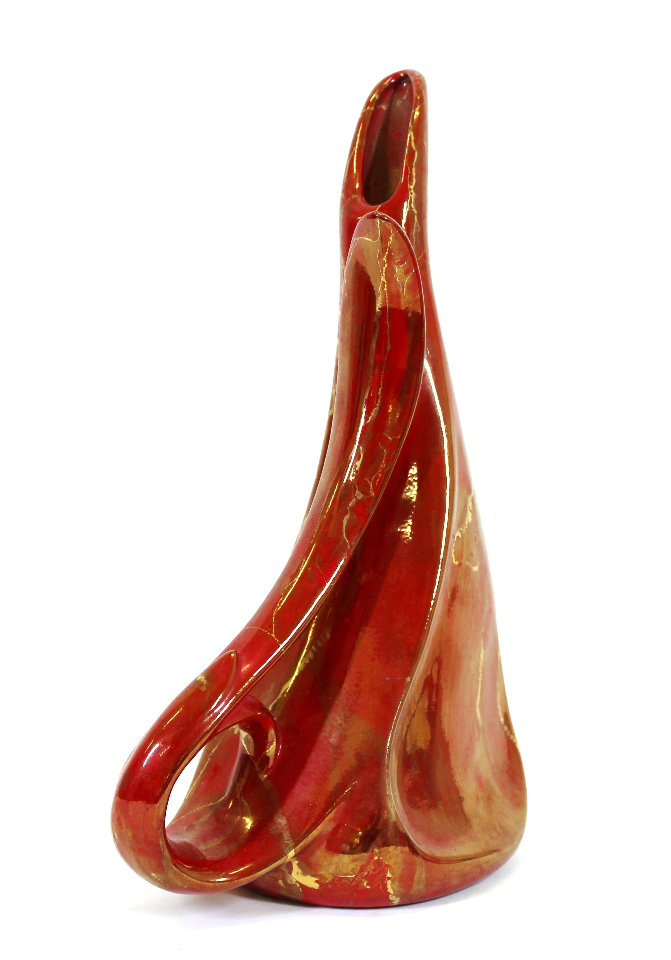 Art Nouveau revival style red ceramic pitcher with partial gold glaze, unmarked.
