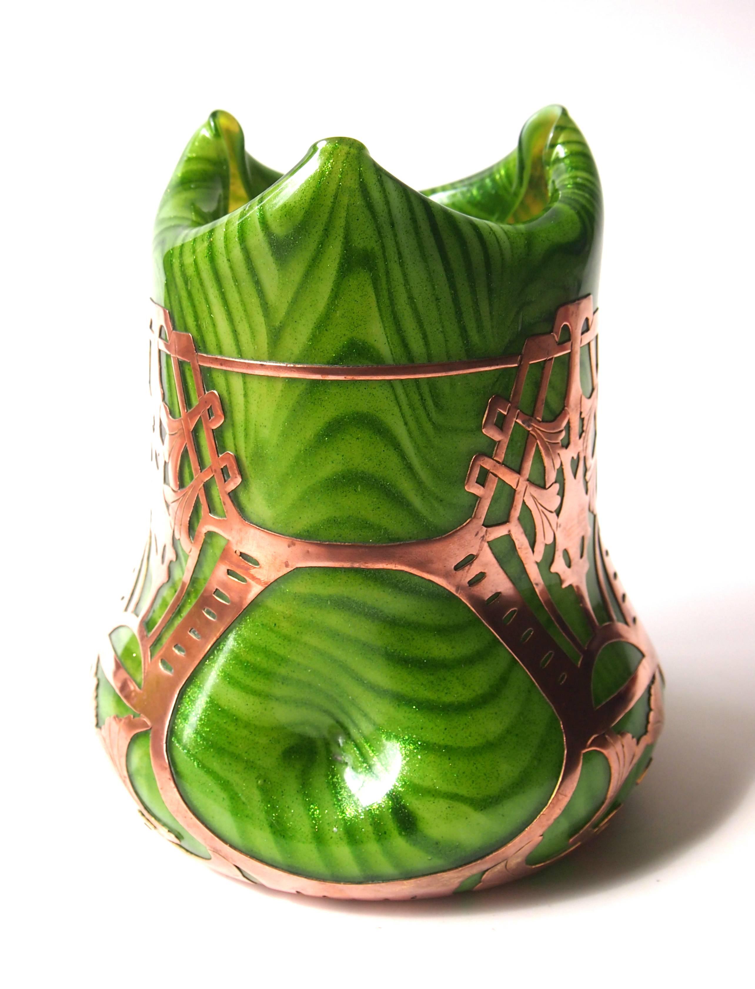 Superior Art Nouveau Rindskopf banded green aventurine vase with Vienna Sessesionist style copper cladding. The glass vase is a great period shape with three dimples and three points the copper overlay has particularly fine detail. 

Rindskopf was