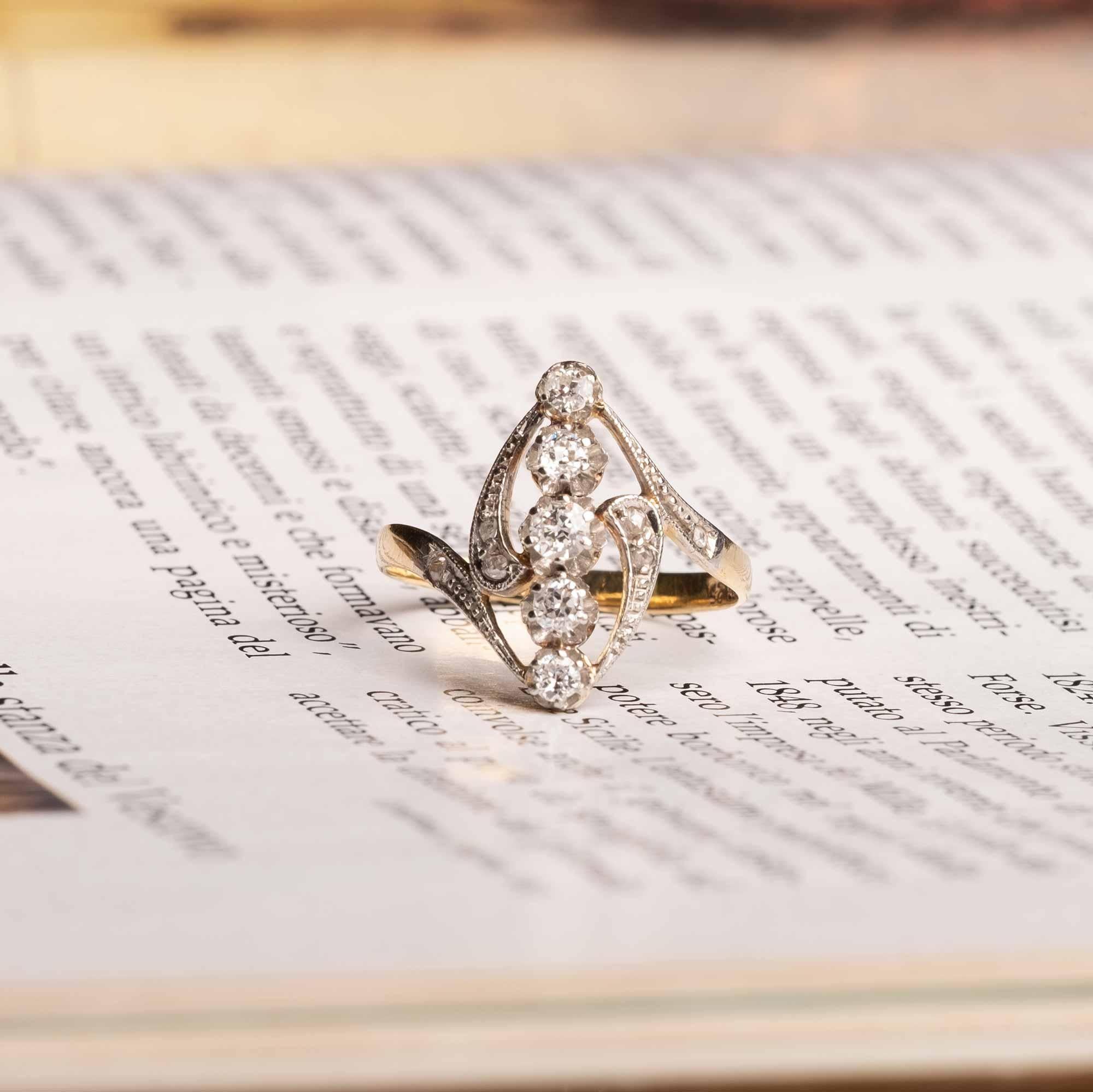 Beautiful Art Nouveau ring (1910c.a.) set in gold and platinum with old cut and rose cut diamonds of circa 0.35ct total, stamped 18ct.

Highlights
- Art Nouveau period ring 1910 c.a.
- 18ct gold and platinum setting
- Old cut and rose cut diamonds