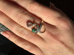 Art Nouveau ring with emerald and diamonds, circa 1900.