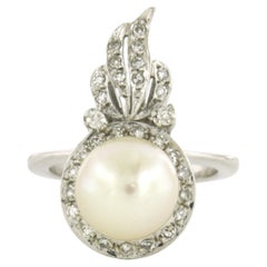 ART NOUVEAU Ring with pearl and single cut diamonds up to 0.20ct 14k white gold