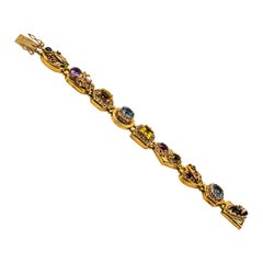 Bracelet Art Nouveau rubis, saphir bleu, émeraude, péridot, citrine, onyx et onyx