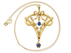 Art Nouveau Ruby, Sapphire and Seed Pearl 21k Yellow Gold Pendant