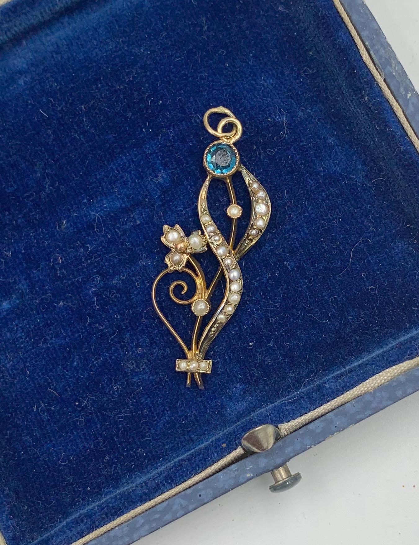 A VICTORIAN - ART NOUVEAU SAPPHIRE PEARL PENDANT IN THE FORM OF A FLOWER.  THE PENDANT IS SO STUNNING WITH THE MOST WONDERFUL THREE DIMENSIONAL DEPICTION OF THE FLOWER.   THE GOLD WORK IS LOVELY AND THE FLOWER IS SET WITH A RADIANT ROUND FACETED
