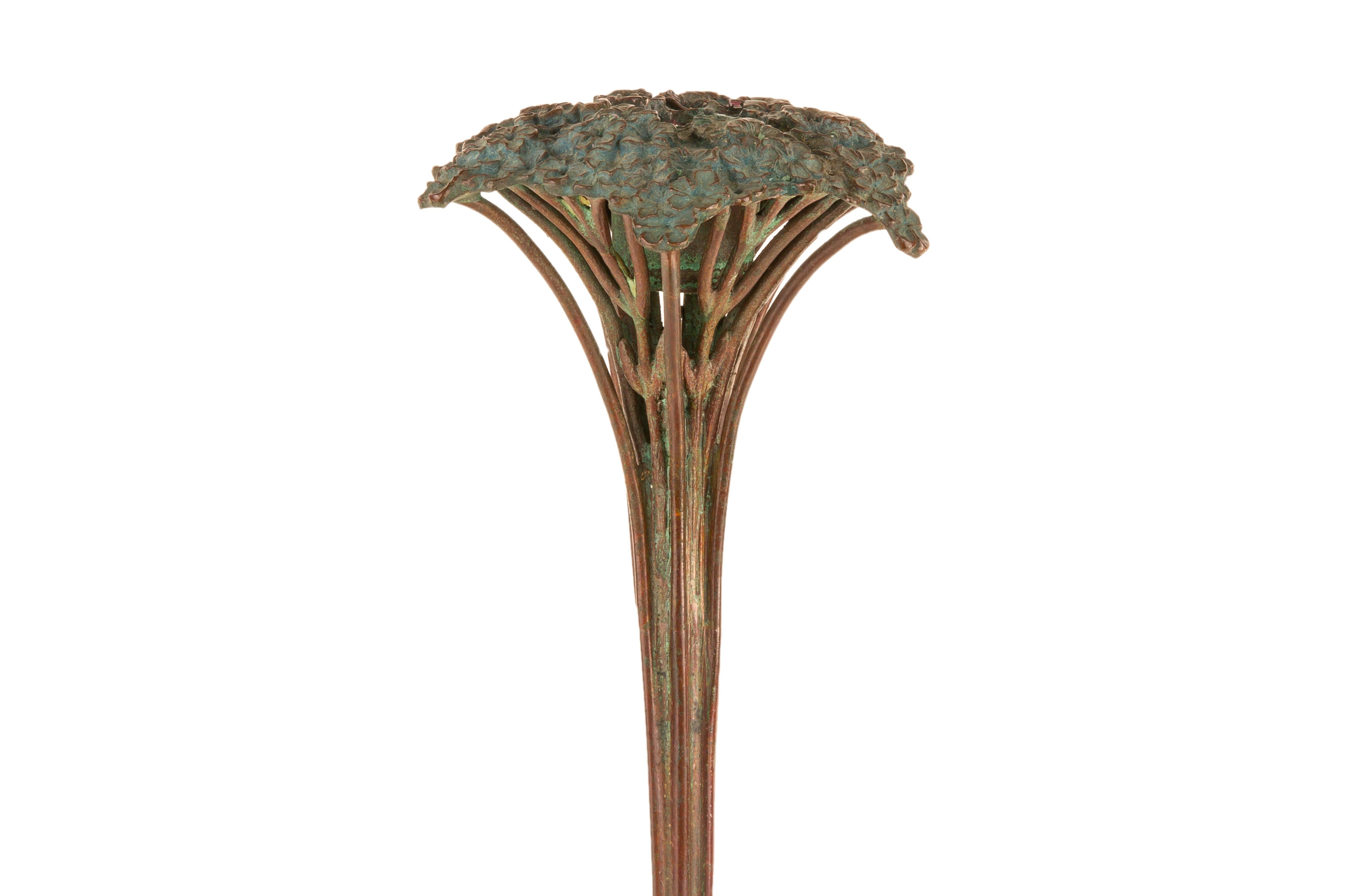 A rare American Art Nouveau patinated bronze 
