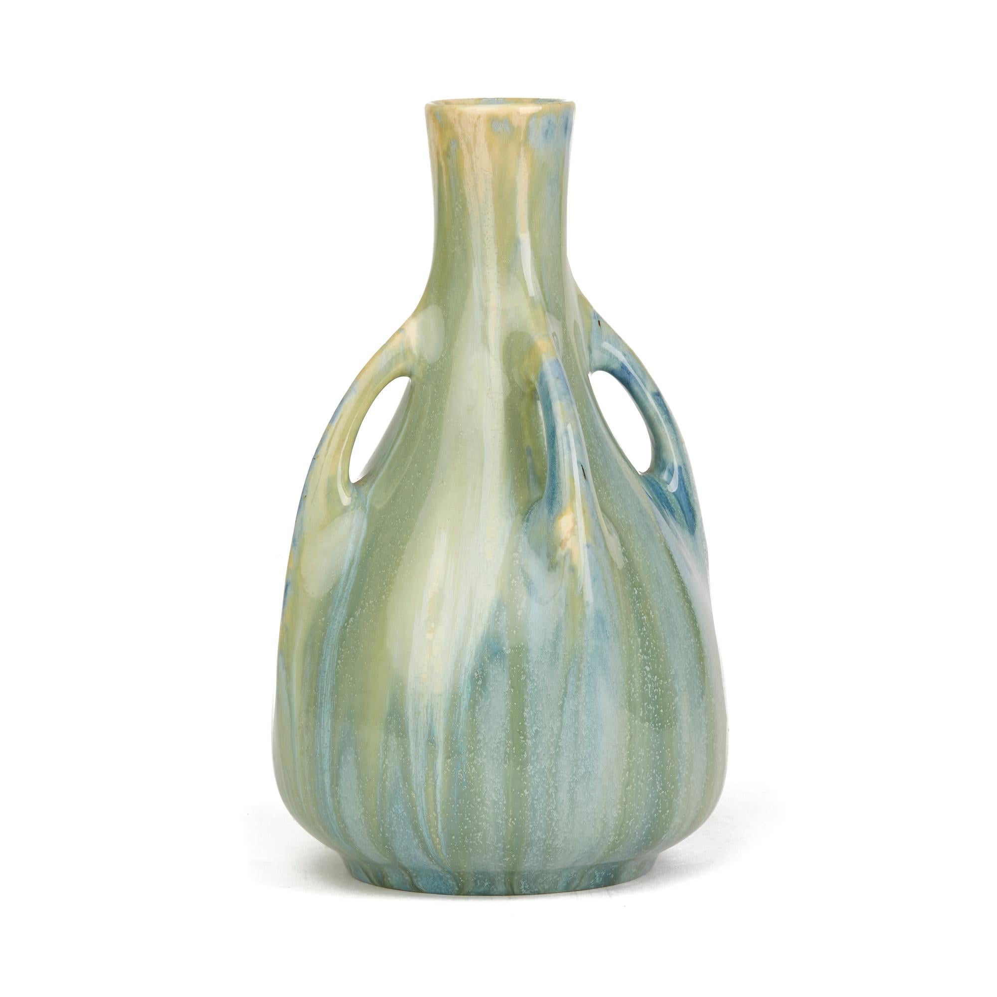 A stylish glazed Swedish Art Nouveau four handled vase by Alf Wallander for Rörstrand. The bottle shaped vase has wonderful streaked green and blue glazes with printed and impressed makers marks to the base.