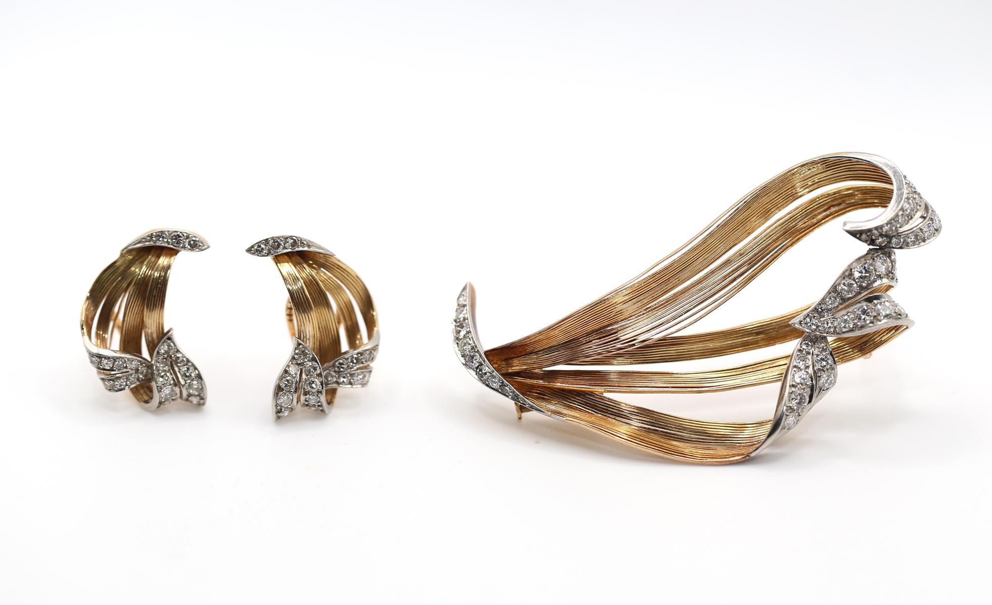 18K Yellow Gold Clips Earrings & Brooch Diamonds Natural Motives.
It is made of gold threads and platinum decorations, set with diamonds.

Created around 1930, Art Nouveau 18 K with traces of the natural world, masterfully executed.

Both items are