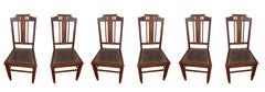 Art Nouveau Set Of Ten Chocolate Brown Leather Chairs
