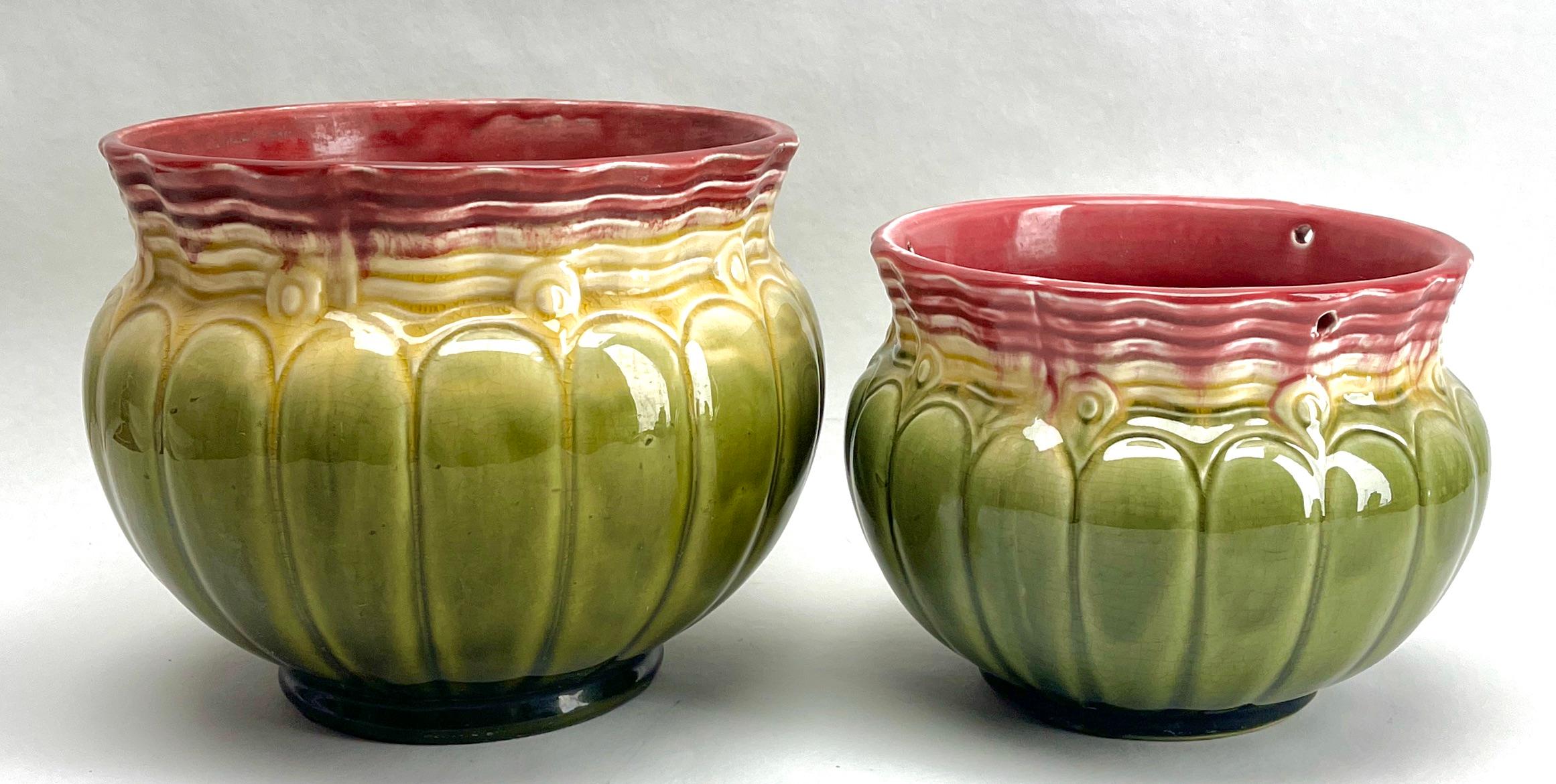 Brilliant handmade Pair hand-glazed Art Nouveau planter jardinière, 1930.

Handmade and hand-glazed in brilliant colored details.
Made in Belgium
Art Nouveau period 1930 fine quality.
The pieces are in Good condition and a real beauty.
Size