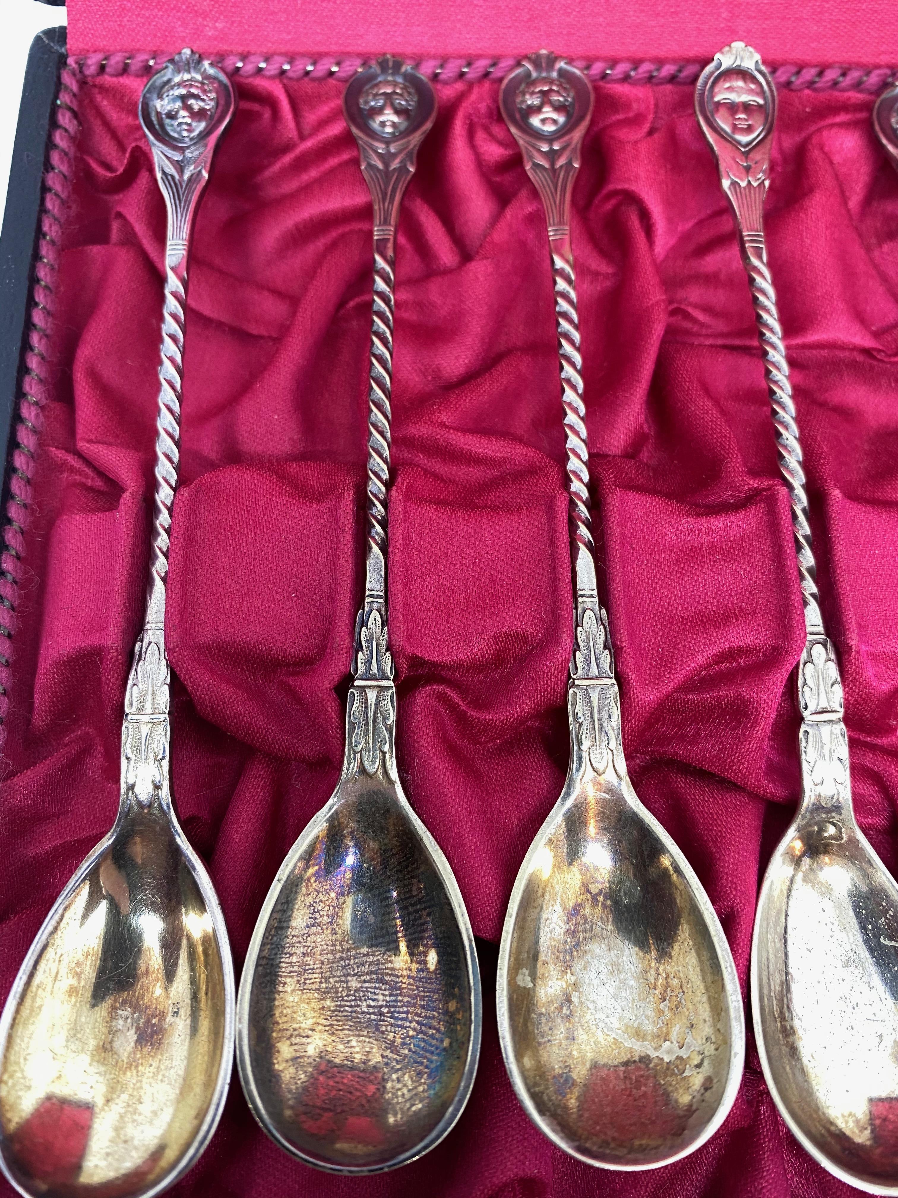 A beautiful Art Nouveau set of six small coffee spoons for espresso size cups. These set is in a original case. Made of silver plated metal, it will make a nice addition to any table. Nice faces on the end of every spoon. Measurements given for each