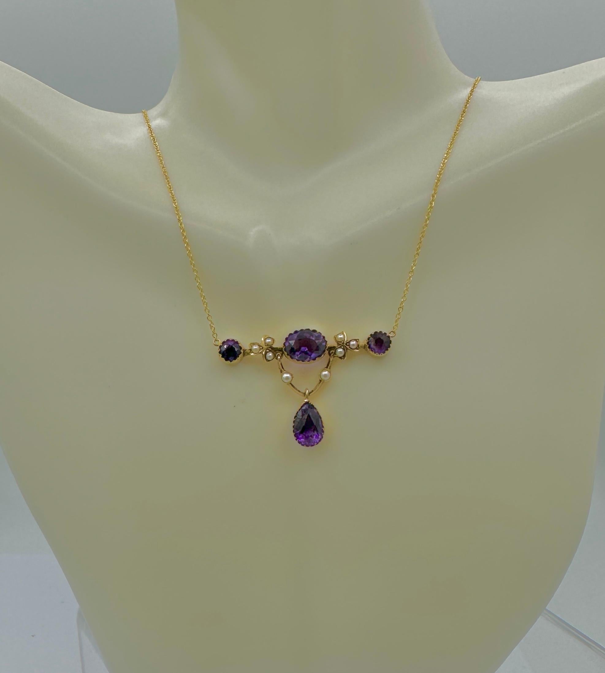 THIS IS A STUNNING ANTIQUE VICTORIAN - ART NOUVEAU - BELLE EPOQUE NECKLACE WITH THE MOST GORGEOUS NATURAL PEAR SHAPE, OVAL AND ROUND FACETED SIBERIAN AMETHYST GEMS.  THE AMETHYSTS ARE SET IN A WONDERFUL CLOVER FLOWER MOTIF PENDANT WITH A PEAR SHAPE