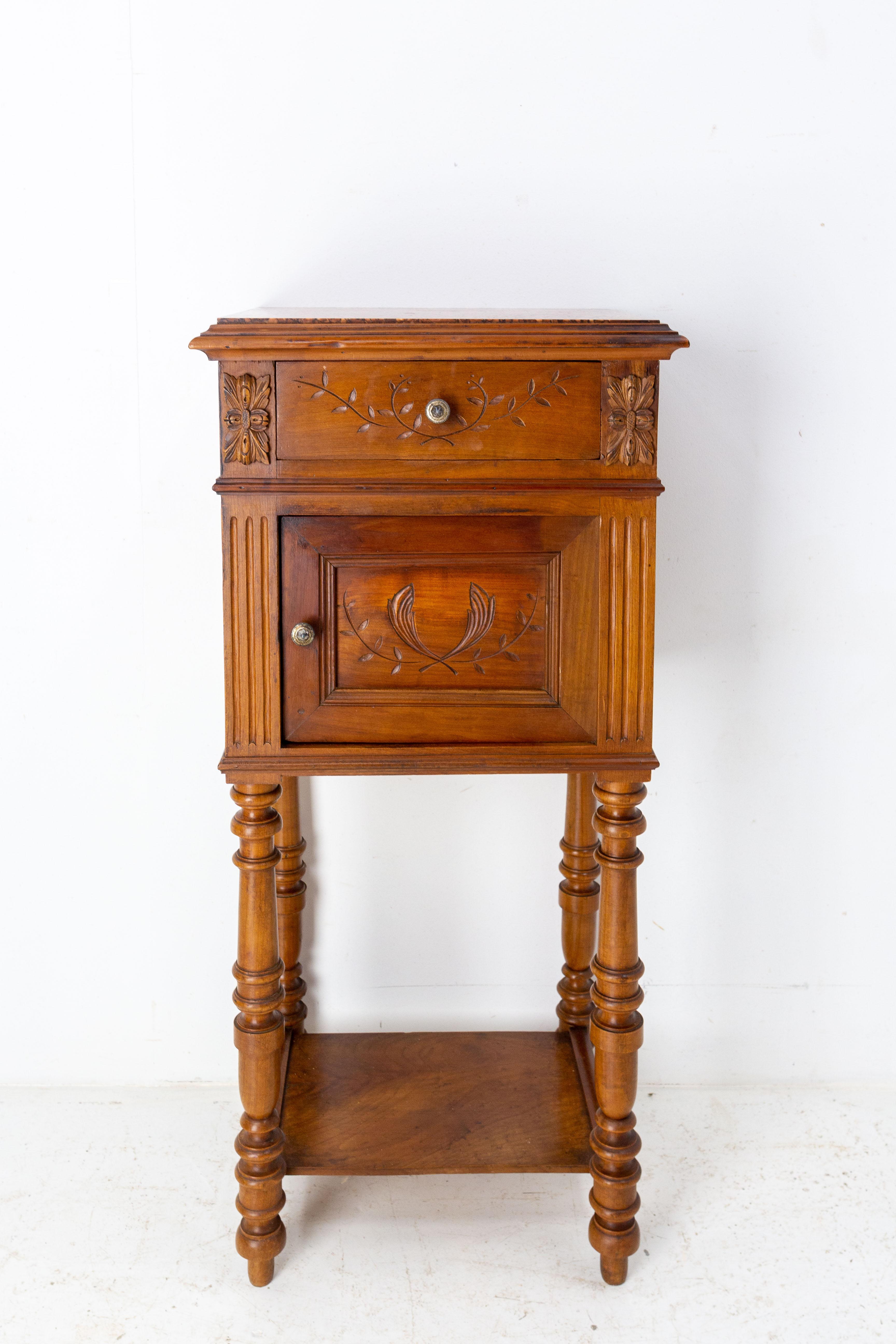 This French nightstand bedside table was made circa 1900. 
This side cabinet has a red marble top, it was carved in cherry wood.
One drawer and one cabinet. 
Art nouveau with carving typical of this period: floral and vegetal motifs.
Good and